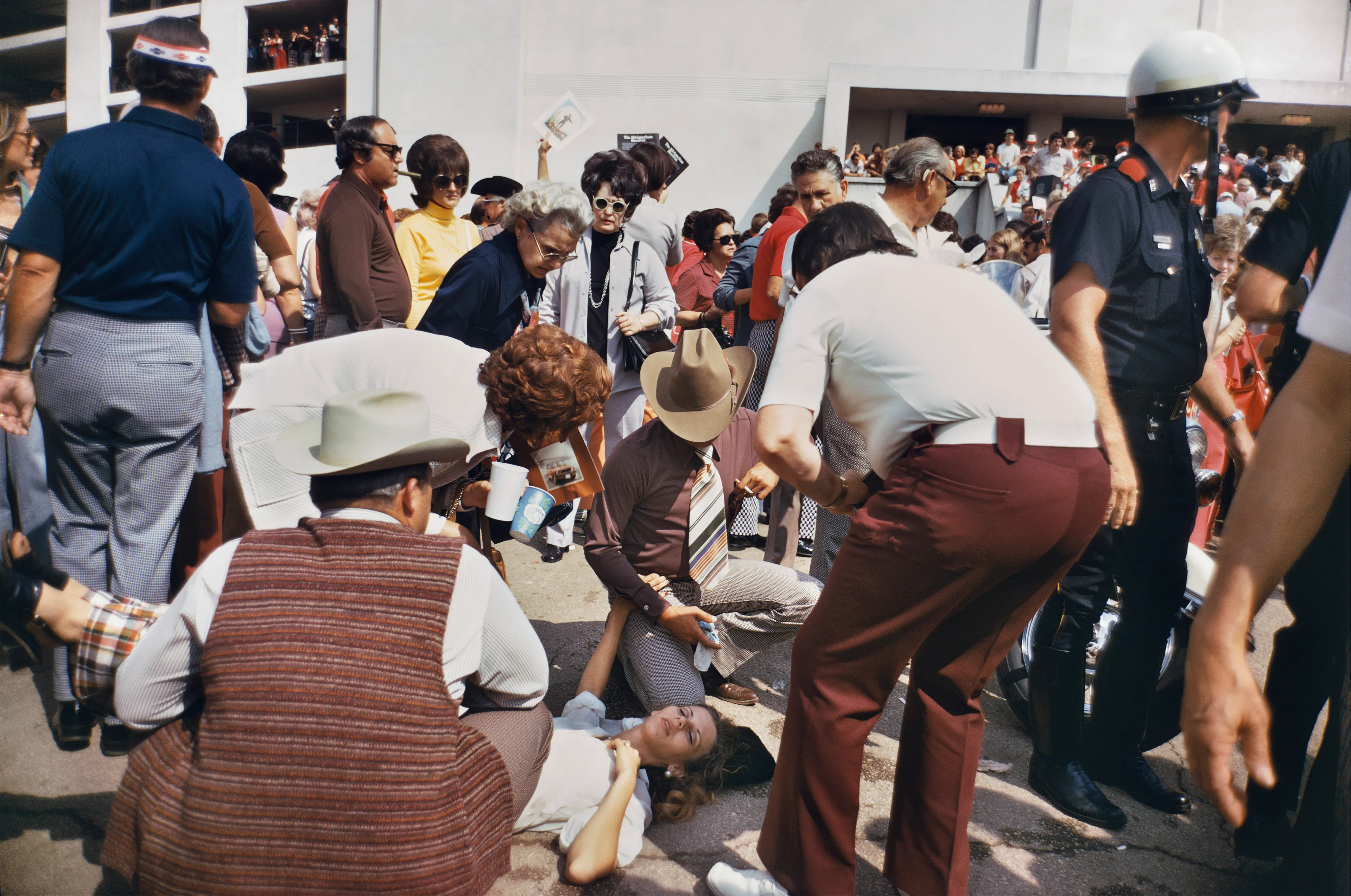 There are few ideas more central to American mythos, and to the traditions of American photography itself, than the great American road trip. Throughout his 50-year career, the photographer Mitch Epstein has ventured throughout the country seeking the nexus points that define American identity in all its strange and unexpected contradictions.

Photographed throughout the 70s and 80s, Epstein’s Recreation surveys the rituals of pleasure and undercurrent of alienation that defined late twentieth-century America. The breadth of places and subjects Epstein explored take the form of a visual epic that spans from coast to coast and across social and cultural divides. Throughout the series, the photographer’s voice intersperses joy with curiosity, sorrow with earnestness, and casts stylistic and emotional nets widely to capture the endless span of late century American identity. Epstein began Recreation at a time when color photography had barely begun to become accepted within the historical photographic canon. Along with his contemporaries in Stephen Shore, Joel Sternfeld, Joel Meyerowitz, and William Eggleston, Epstein helped to define a new photo-literative tradition while engaging in the impossible task of defining what it means to be American.

The title Recreation itself is a testament to Post-War American affluence that saturates the frames of Epstein’s pictures. When touring the work we encounter moments of mundane serenity, but also the debaucheries of nightlife, antics of American youth, and the enriched banalities of family life. What we see in Epstein’s pictures are time capsules of a particular era of American capitalist excess, a cultural snapshot of the last vestiges of pre-techno-dominant lifestyles, and an ode to the attitudes of American exceptionalism that proudly pronounce, “we just do what we want.”

Edition: 1 of 1