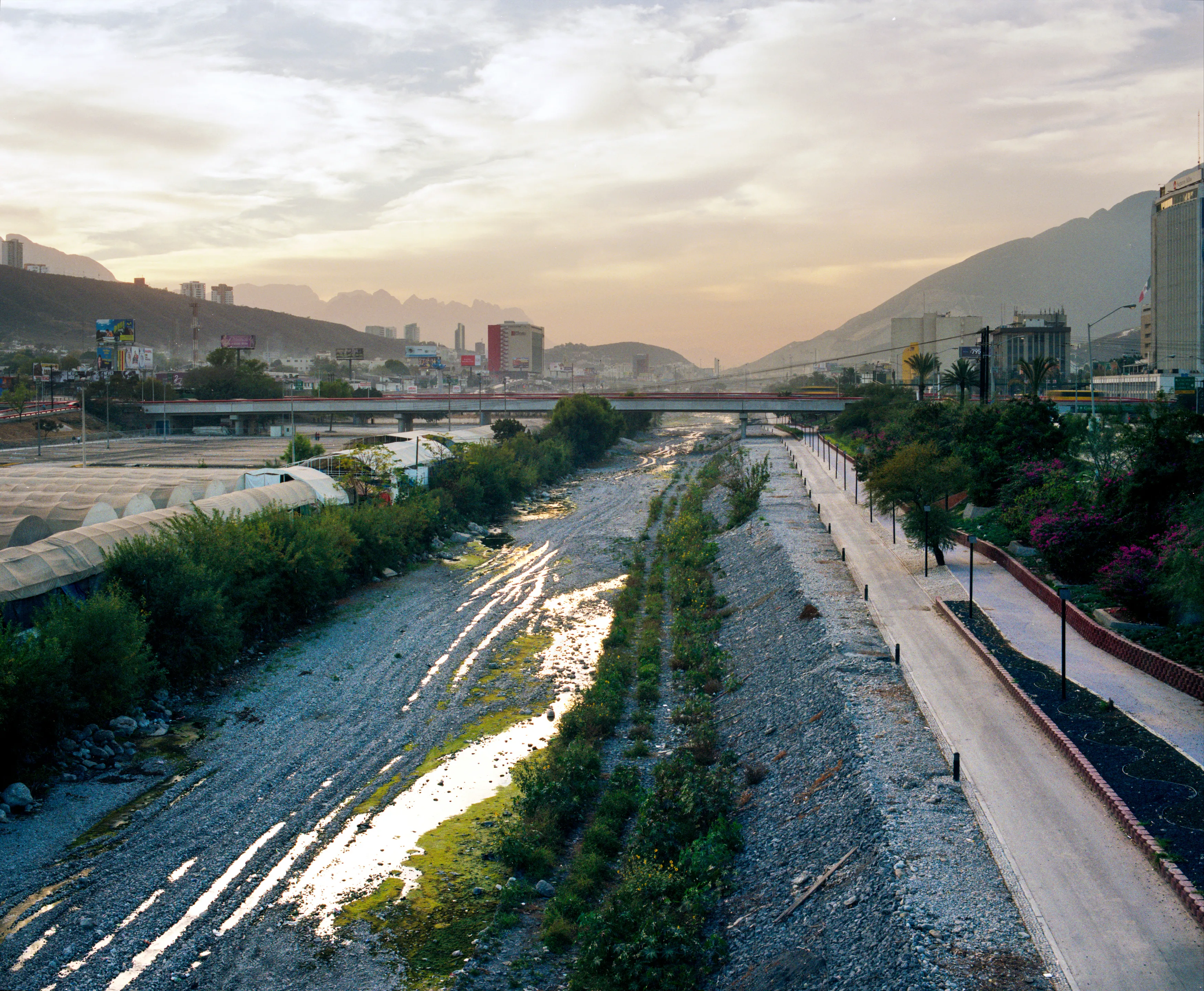 State of Nuevo León, Mexico, 2005-2010. This image is part of a 5-year project called Suburbia Mexicana. I wanted to document some of the unintended consequences of the housing bubble many cities in Mexico were going through. I was also very interested in the aesthetic questions posed by using ultra beautiful landscape imagery to represent ecological degradation. It is a nod to the romantic use of tragedy in paintings; a visual exploration of the grandeur of disaster as a way to comment on the other side of Mexico’s copy pasted ideals of homeownership.