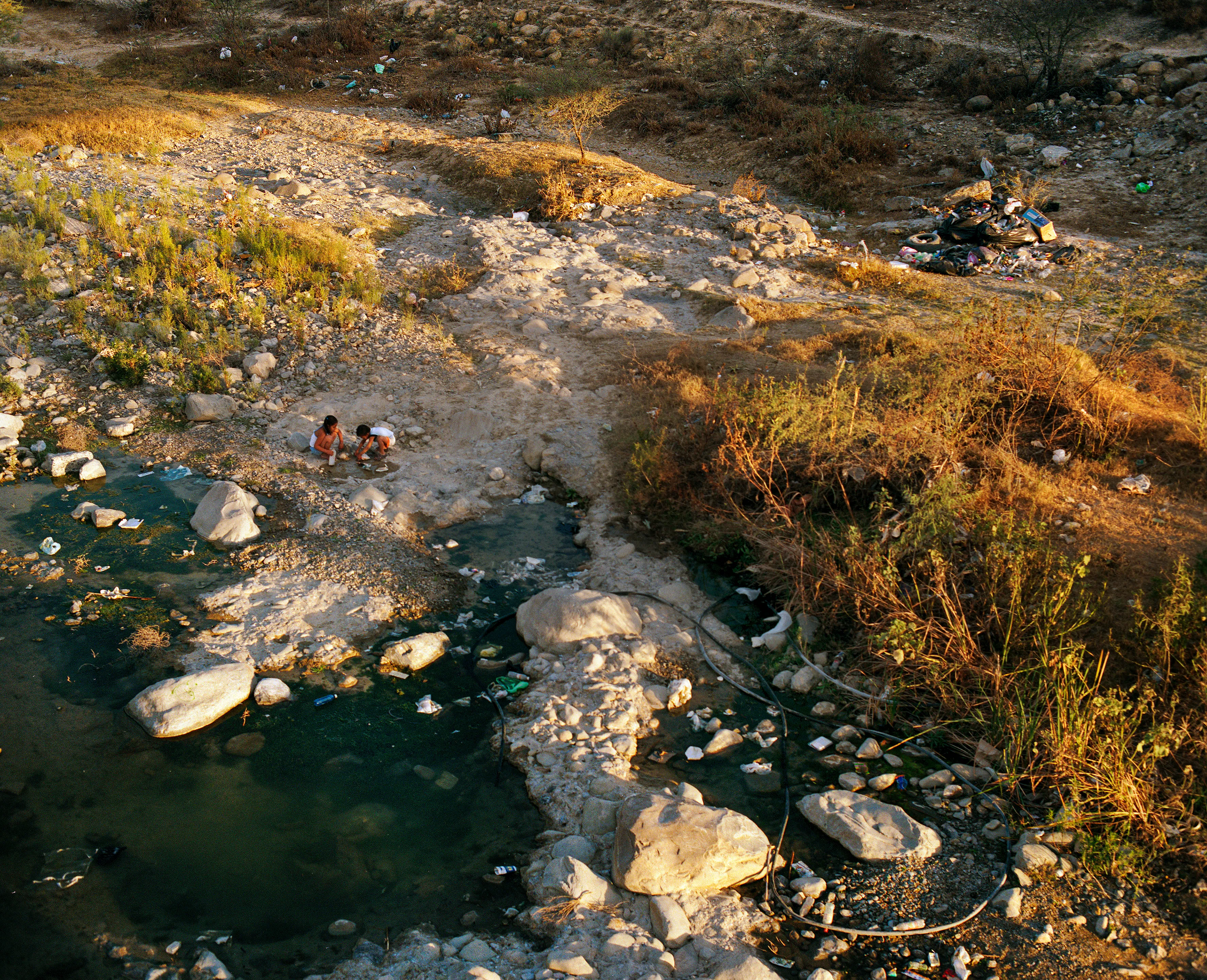 State of Nuevo León, Mexico, 2005-2010. This image is part of a 5-year project called Suburbia Mexicana. I wanted to document some of the unintended consequences of the housing bubble many cities in Mexico were going through. I was also very interested in the aesthetic questions posed by using ultra beautiful landscape imagery to represent ecological degradation. It is a nod to the romantic use of tragedy in paintings; a visual exploration of the grandeur of disaster as a way to comment on the other side of Mexico’s copy pasted ideals of homeownership.