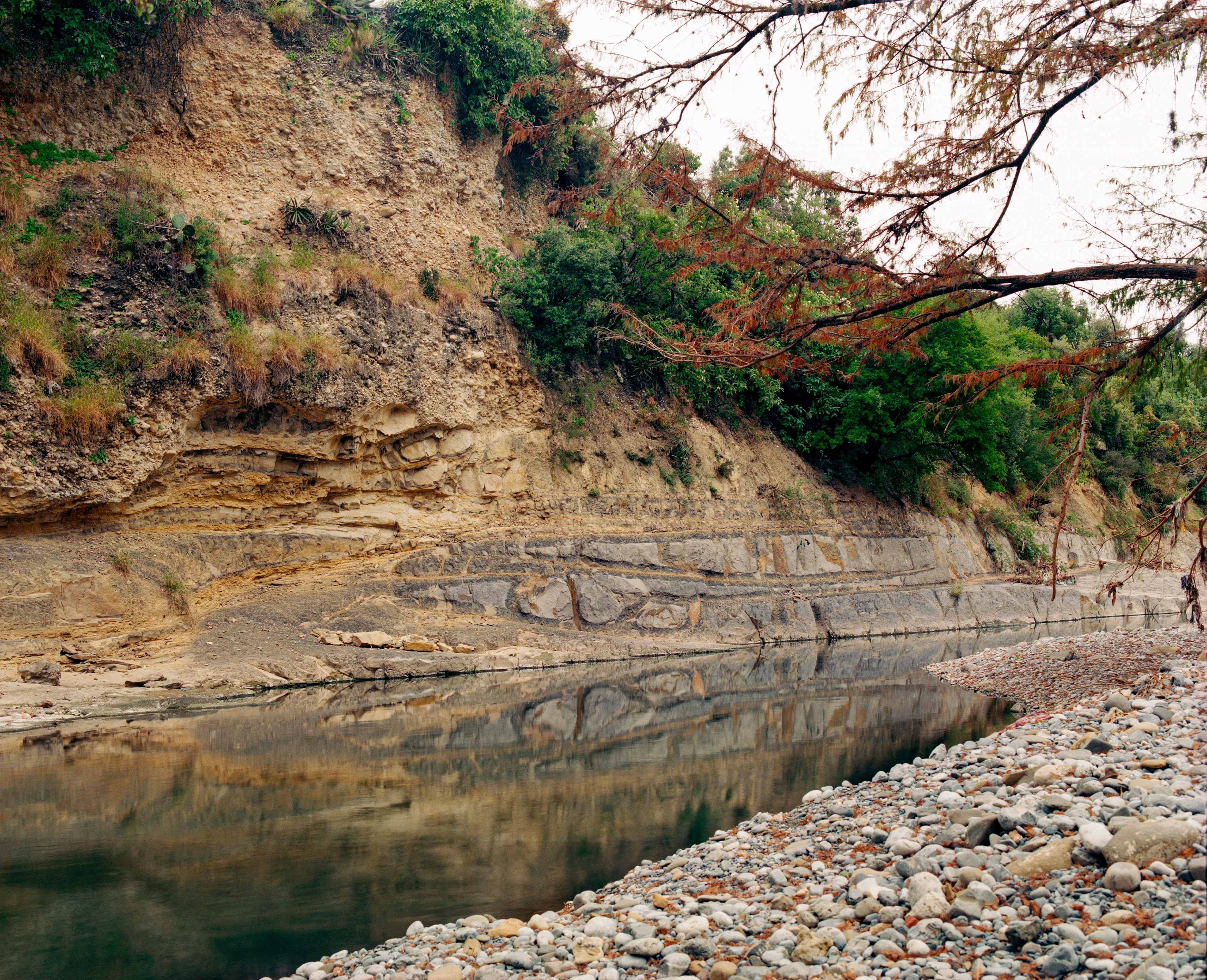 State of Nuevo León, Mexico, 2005-2010. This image is part of a 5-year project called Suburbia Mexicana. I wanted to document some of the unintended consequences of the housing bubble many cities in Mexico were going through. I was also very interested in the aesthetic questions posed by using ultra beautiful landscape imagery to represent ecological degradation. It is a nod to the romantic use of tragedy in paintings; a visual exploration of the grandeur of disaster as a way to comment on the other side of Mexico’s copy pasted ideals of homeownership.