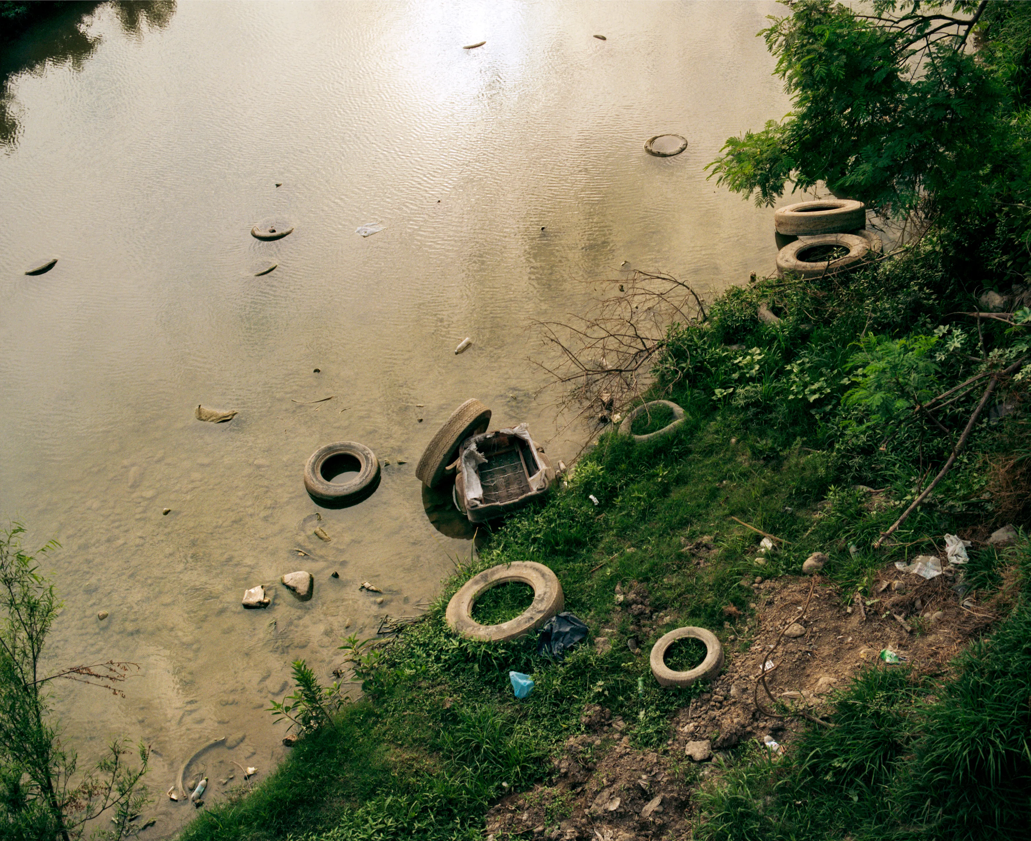 State of Nuevo León, Mexico, 2005-2010. This image is part of a 5-year project called Suburbia Mexicana. I wanted to document some of the unintended consequences of the housing bubble many cities in Mexico were going through. I was also very interested in the aesthetic questions posed by using ultra beautiful landscape imagery to represent ecological degradation. It is a nod to the romantic use of tragedy in paintings; a visual exploration of the grandeur of disaster as a way to comment on the other side of Mexico’s copy pasted ideals of homeownership.