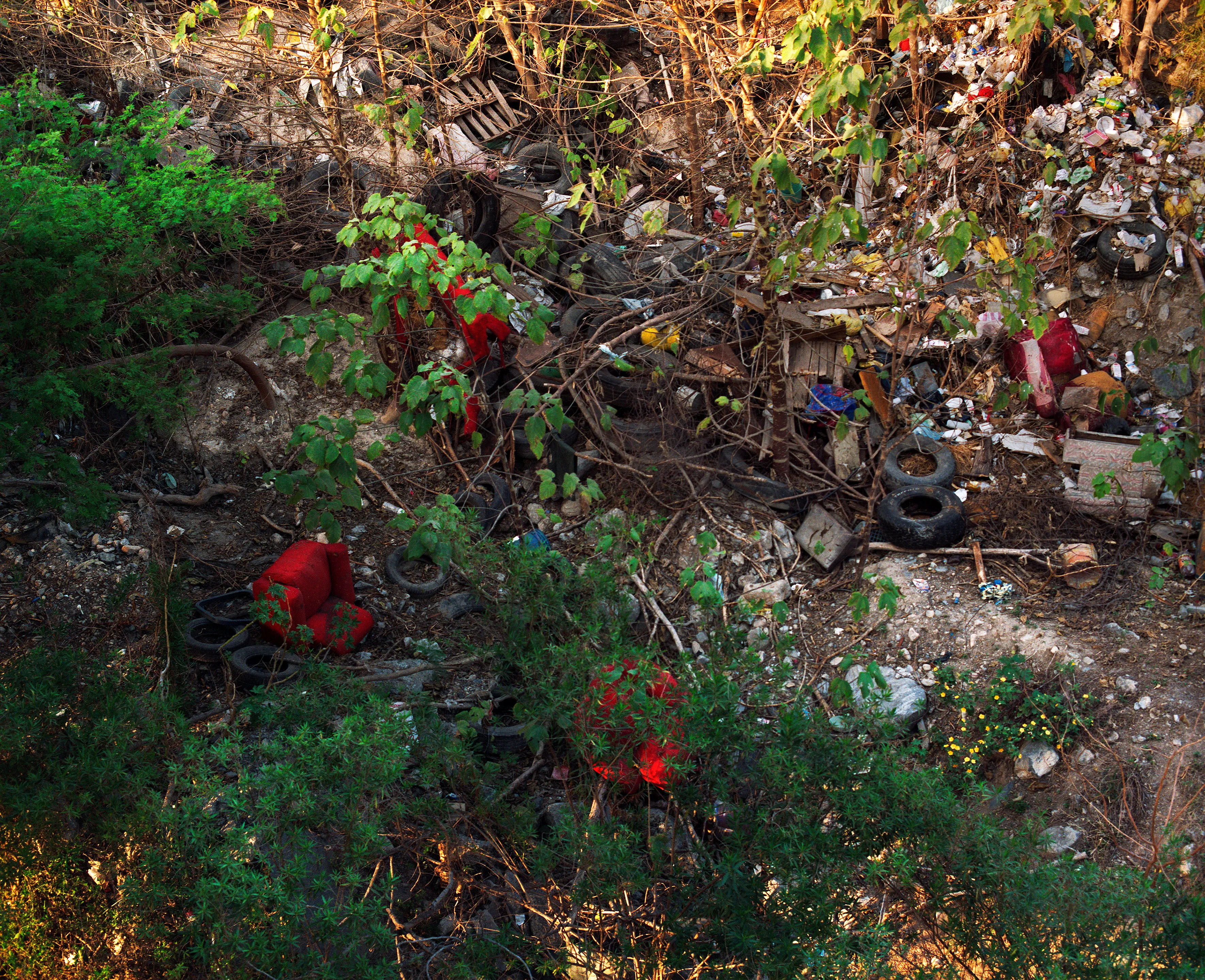 State of Nuevo León, Mexico, 2005-2010. This image is part of a 5-year project called Suburbia Mexicana. I wanted to document some of the unintended consequences of the housing bubble many cities in Mexico were going through. I was also very interested in the aesthetic questions posed by using ultra beautiful landscape imagery to represent ecological degradation. It is a nod to the romantic use of tragedy in paintings; a visual exploration of the grandeur of disaster as a way to comment on the other side of Mexico’s copy pasted ideals of homeownership.