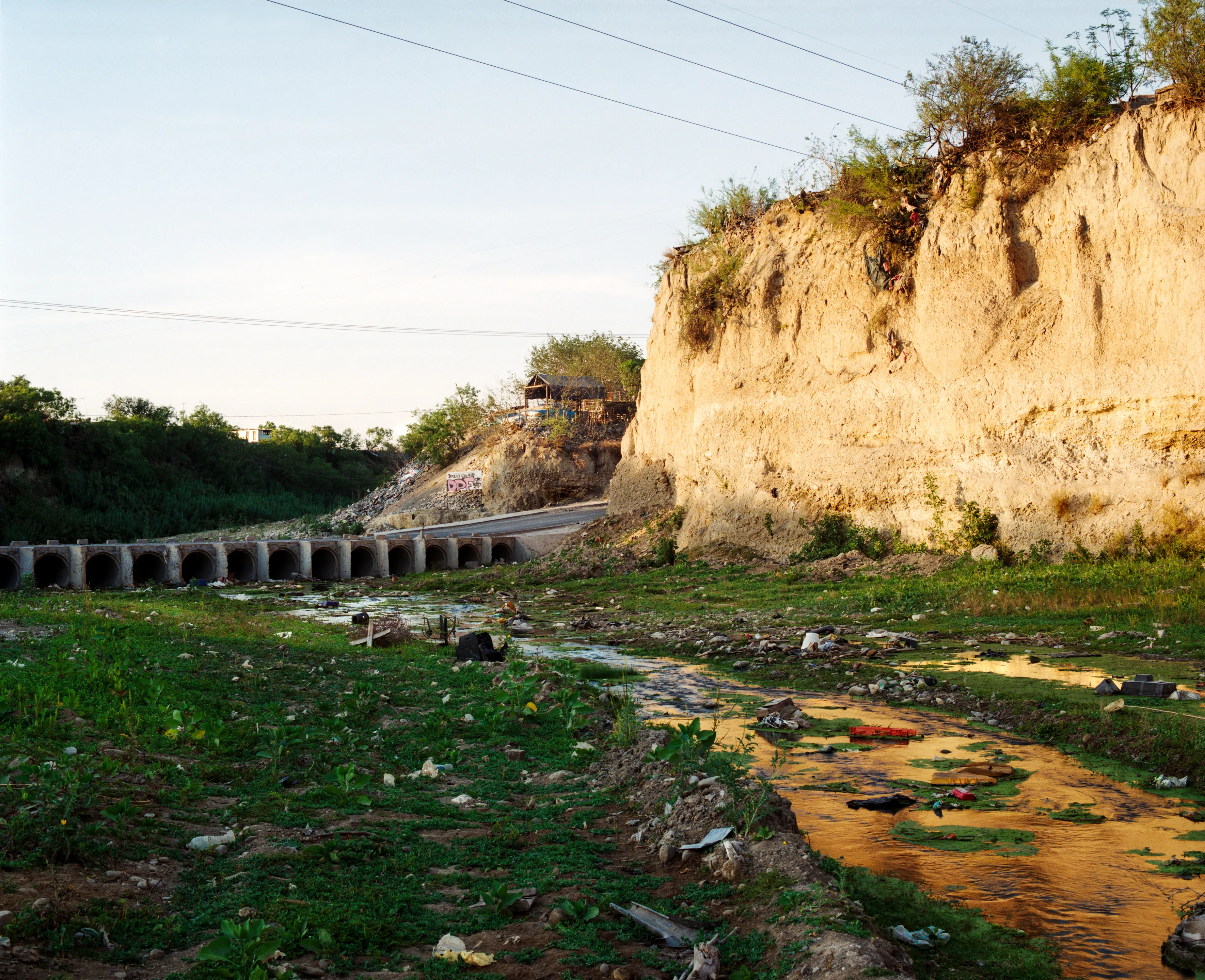 State of Nuevo León, Mexico, 2005-2010. This image is part of a 5-year project called Suburbia Mexicana. I wanted to document some of the unintended consequences of the housing bubble many cities in Mexico were going through. I was also very interested in the aesthetic questions posed by using ultra beautiful landscape imagery to represent ecological degradation. It is a nod to the romantic use of tragedy in paintings; a visual exploration of the grandeur of disaster as a way to comment on the other side of Mexico’s copy pasted ideals of homeownership.