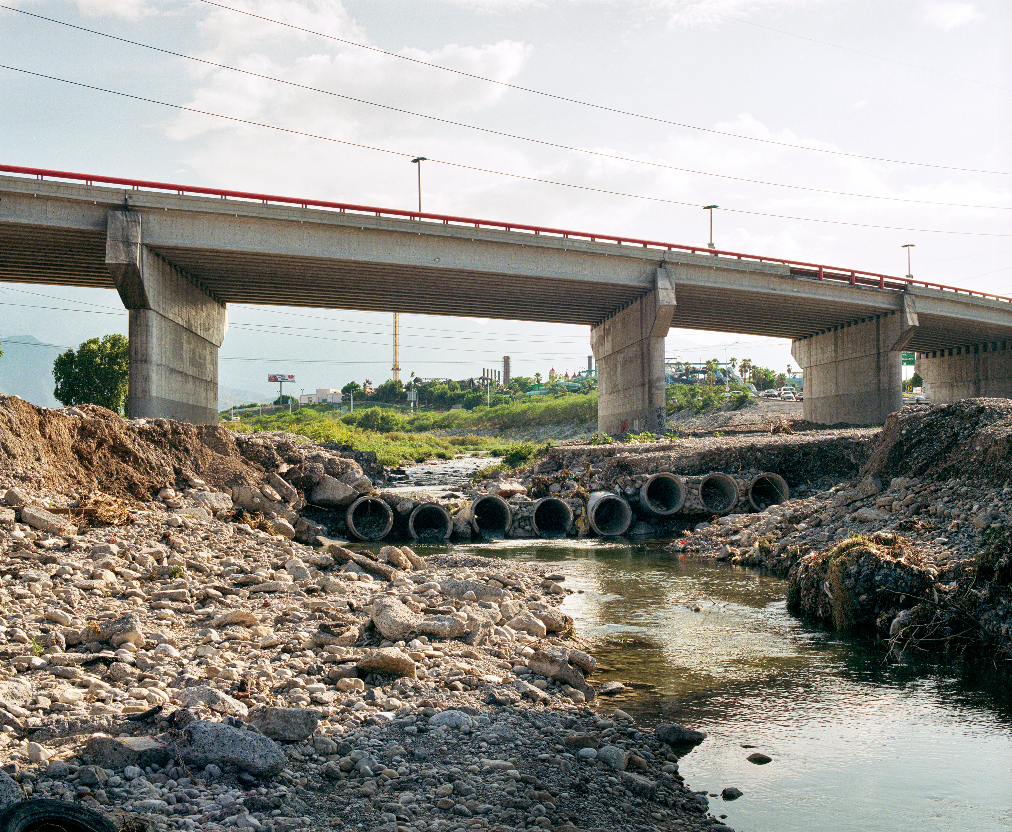 State of Nuevo León, Mexico, 2005-2010. This image is part of a 5-year project called Suburbia Mexicana. I wanted to document some of the unintended consequences of the housing bubble many cities in Mexico were going through. I was also very interested in the aesthetic questions posed by using ultra beautiful landscape imagery to represent ecological degradation. It is a nod to the romantic use of tragedy in paintings; a visual exploration of the grandeur of disaster as a way to comment on the other side of Mexico’s copy pasted ideals of homeownership.