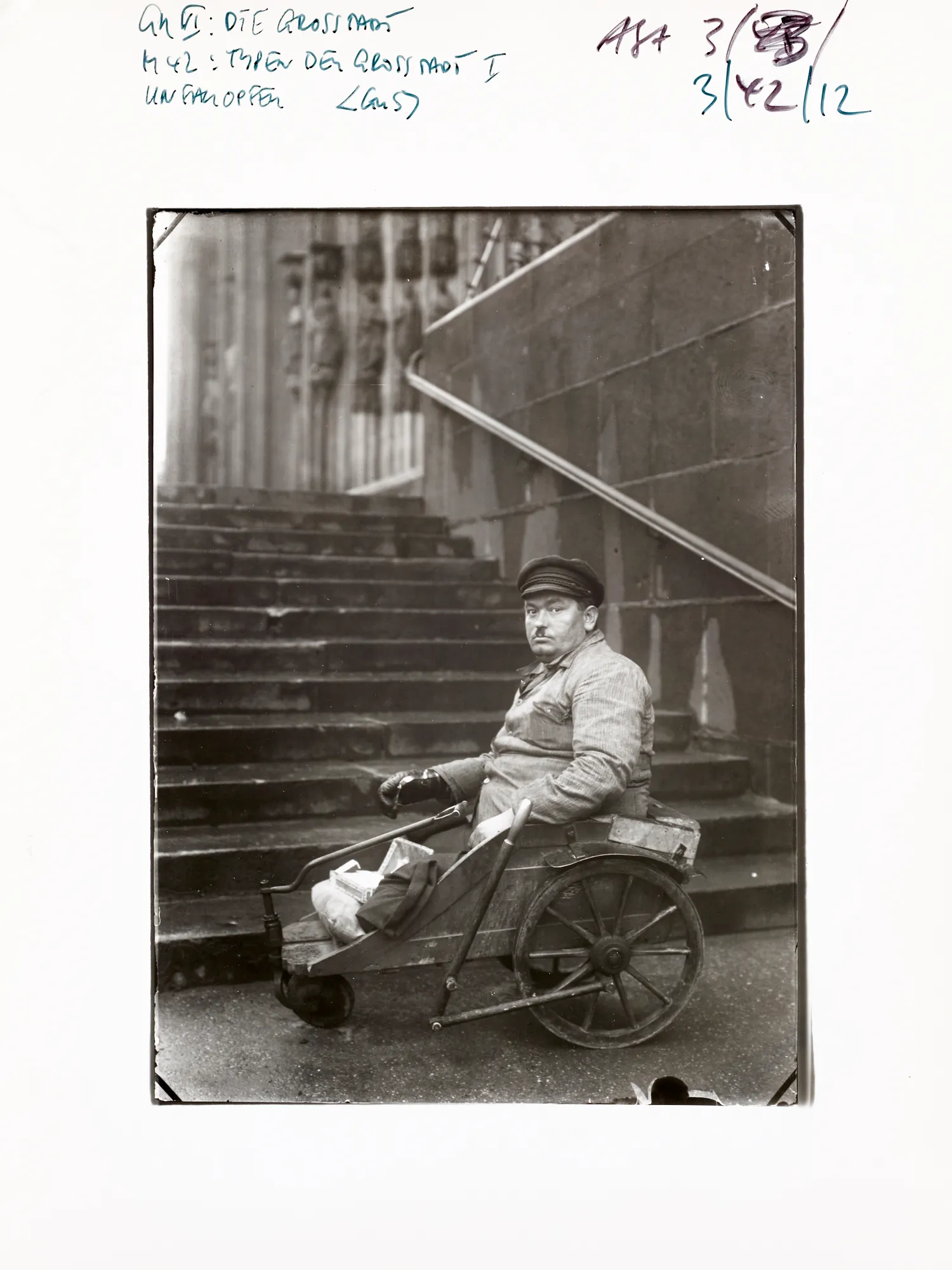 An NFT from the AS10k+ Project, launched to bring the historical archive of August Sander to the Digital World. Each NFT represents ownership of the physical contact print made by Gerd Sander in 1988/89 and depicted by the image as well as access to the August Sander Research Database where the historical legacy of the Sander Family Estate will become publicly available for research. Ownership of the physical contact sheet is determined by the wallet in which the NFT is owned, regardless of wether the contact print has been redeemed or not.