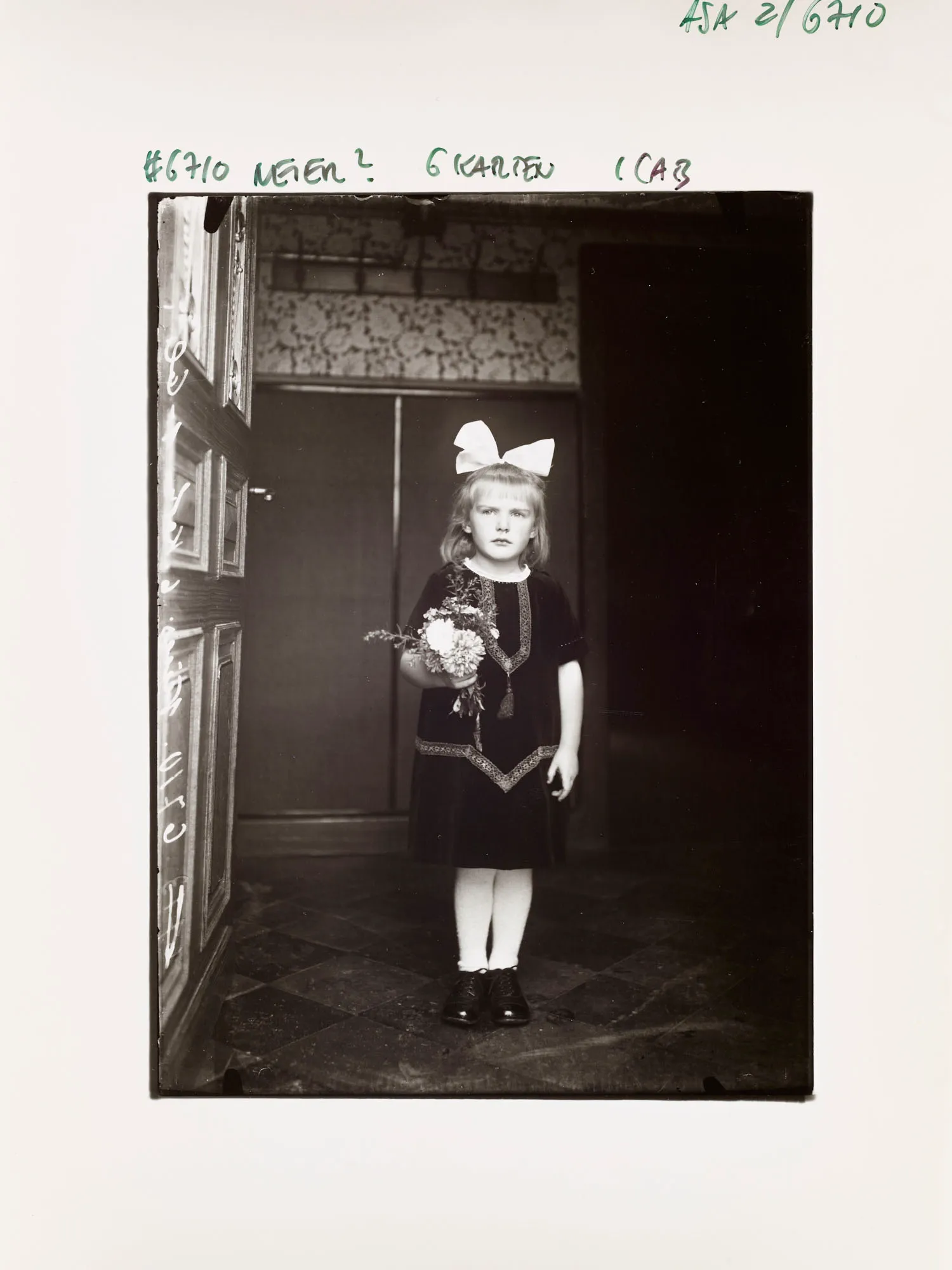 An NFT from the AS10k+ Project, launched to bring the historical archive of August Sander to the Digital World. Each NFT represents ownership of the physical contact print made by Gerd Sander in 1988/89 and depicted by the image as well as access to the August Sander Research Database where the historical legacy of the Sander Family Estate will become publicly available for research. Ownership of the physical contact sheet is determined by the wallet in which the NFT is owned, regardless of wether the contact print has been redeemed or not.
