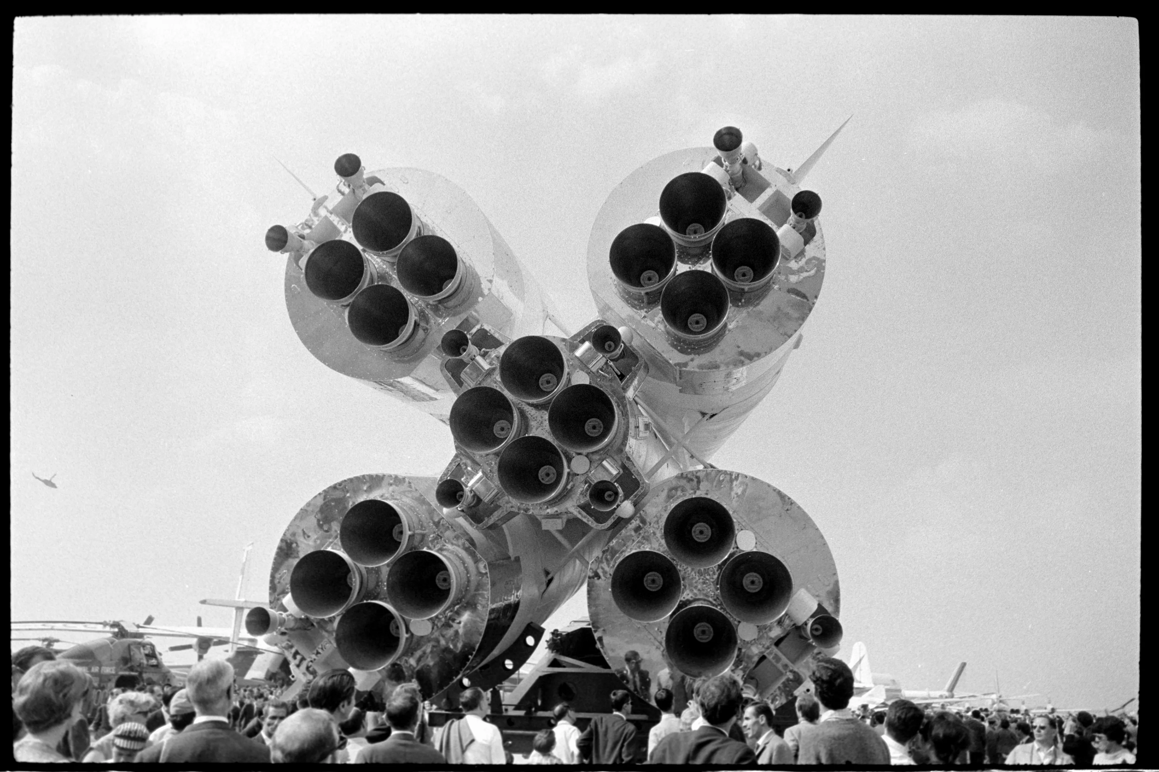 Le Bourget Air Show, Paris, France, 1967

Joel Meyerowitz embarked on an extensive journey across Europe between 1966 and 1967, his travels taking him to numerous countries including France, Greece, Spain, Germany, Turkey, Bulgaria, Morocco, England, Ireland, Wales, and Scotland.

In May 1967, while in Paris, Meyerowitz captured a striking image. This photograph showcased a replica of the Vostok spaceship, complete with its rocket launcher and service platform, displayed at the International Air Show held at Le Bourget Airfield in Paris.

Yuri Gagarin, a Soviet pilot and cosmonaut, etched his name in history by becoming the first human to venture into outer space. On April 12, 1961, aboard the Vostok 1 capsule, Gagarin successfully completed one full orbit around Earth.