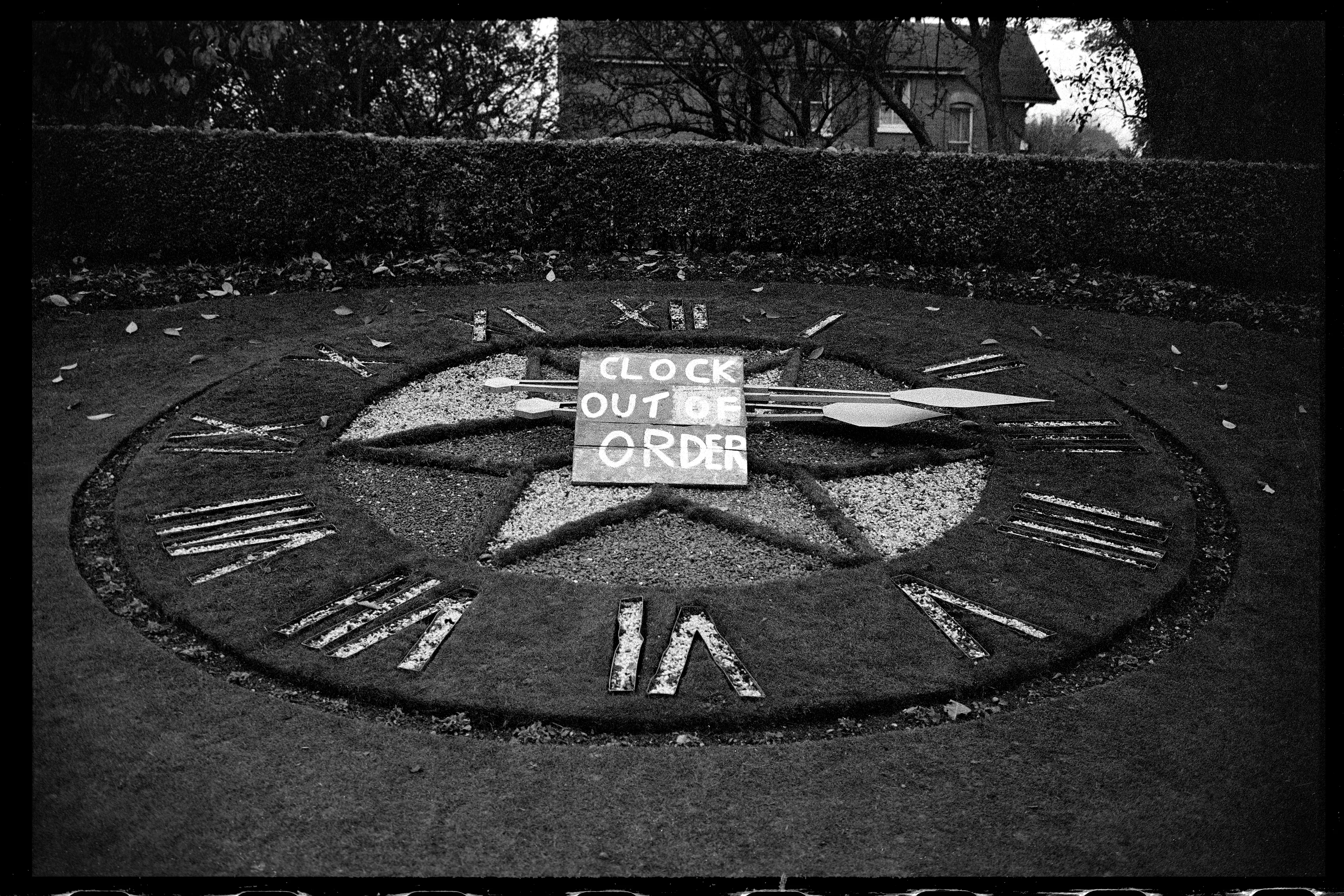 Circle clock on lawn, England, 1966

Continuing the theme of circles, this image captures a disarrayed clock in England, 1966.