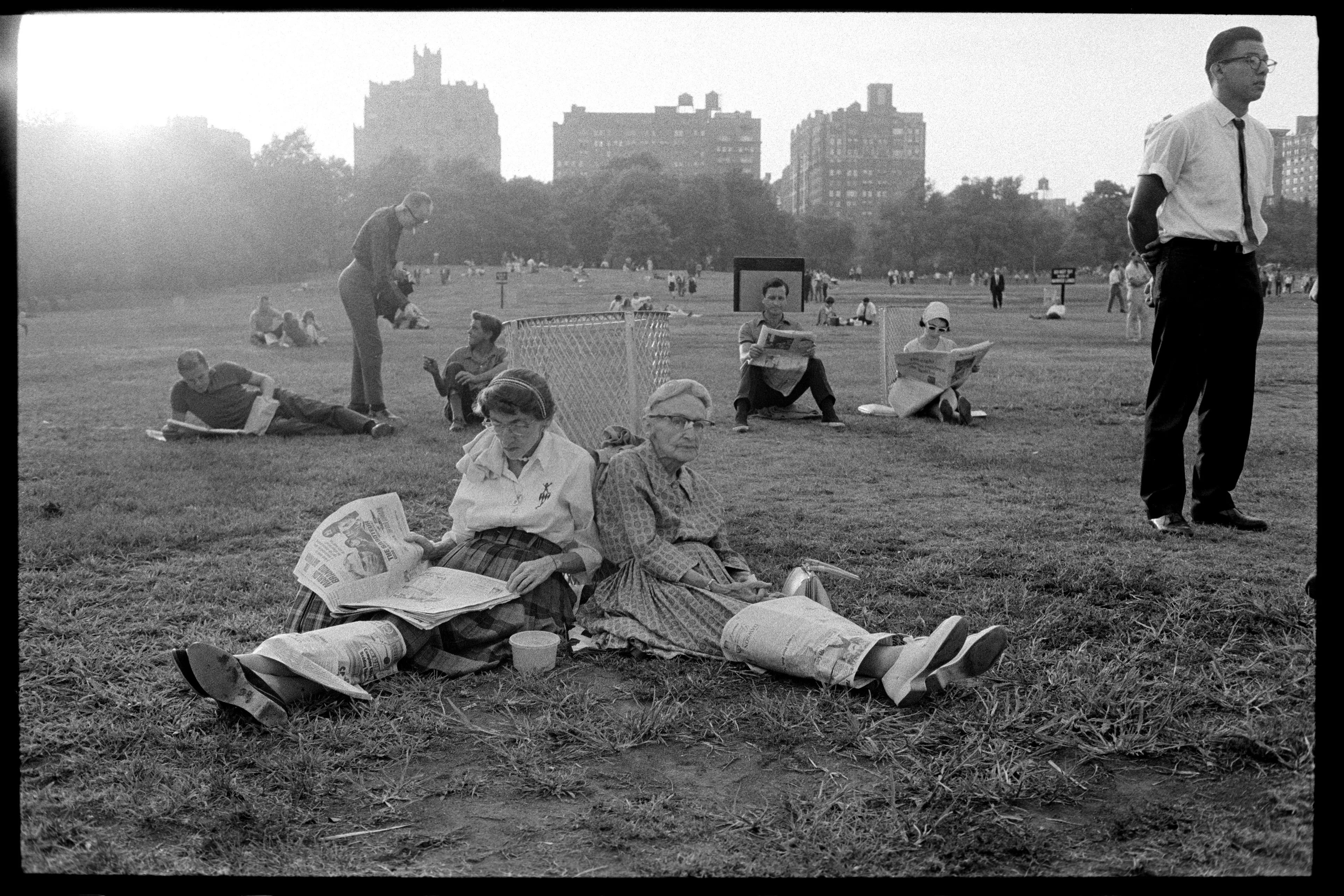 New York City, USA, 1965

Two women sitting back-to-back as evening arrives in New York City's Central Park.