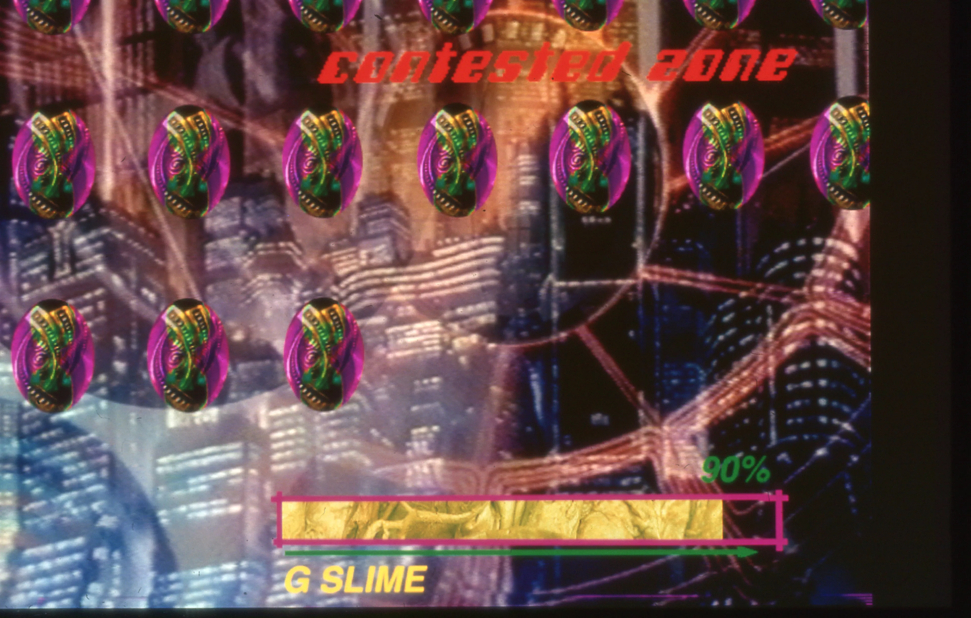 Contested Zone (1993) by VNS Matrix is a digital image created for the 1993 project ALL NEW GEN. Part artwork, part computer game, ALL NEW GEN was released as a CD-ROM and distributed widely in Australia and internationally. The CD-ROM was also exhibited as the centerpiece of the ALL NEW GEN installation with lighboxes, soundworks, photography, sculptural elements, video and a Bonding Booth for pleasurable distraction.

Join the cyber warrior All New Gen and the renegade tribes of the Contested Zone to sabotage the databanks of Big Daddy Mainframe and launch the New World Disorder. Enter the Contested Zone, a labyrinth of bizarre and mysterious cyberworlds, where the future is now, and Big Daddy Mainframe is in control. Manipulating the minds of the online masses through his nasty neural nets, BDM is expanding his transplanetary empire and nothing will get in his way. But resistance is not futile! All New Gen, an omnipresent being (computer virus, bio simsystem, intelligent mist) is on a mission with the renegade tribes to sabotage the info core of the insidious data dictator. All New Gen is assisted on her mission by the DNA Sluts, a band of renegade Sheroes; along with ferals, data deviants, cortex crones and code warriors.

For more context, please visit: <a href="https://vnsmatrix.net/projects/all-new-gen" target="_blank" class="link">https://vnsmatrix.net/projects/all-new-gen</a>
