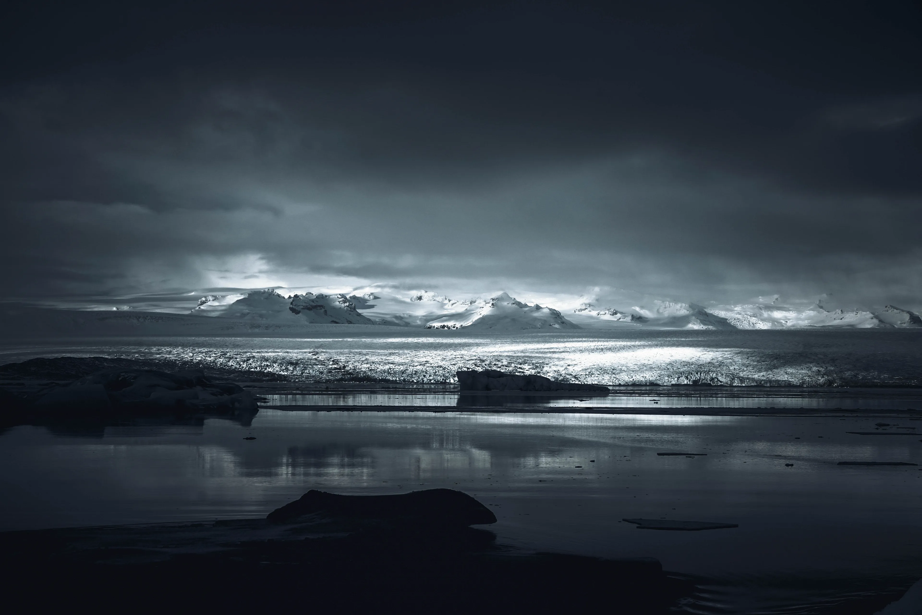 Some say the world will end in fire, some say in ice. Iceland is the country where dreams are a reality, and Jökulsárlón is the type of place that's hard to leave. You can breathe the silence and watch the frozen figures that float around the lagoon. After a moment of beholding the landscape in silence, you realize you are in another world. Iceland is the place that makes meaningful marks in your life.

Photo taken at Jökulsárlón glacier, Iceland (February 2018)