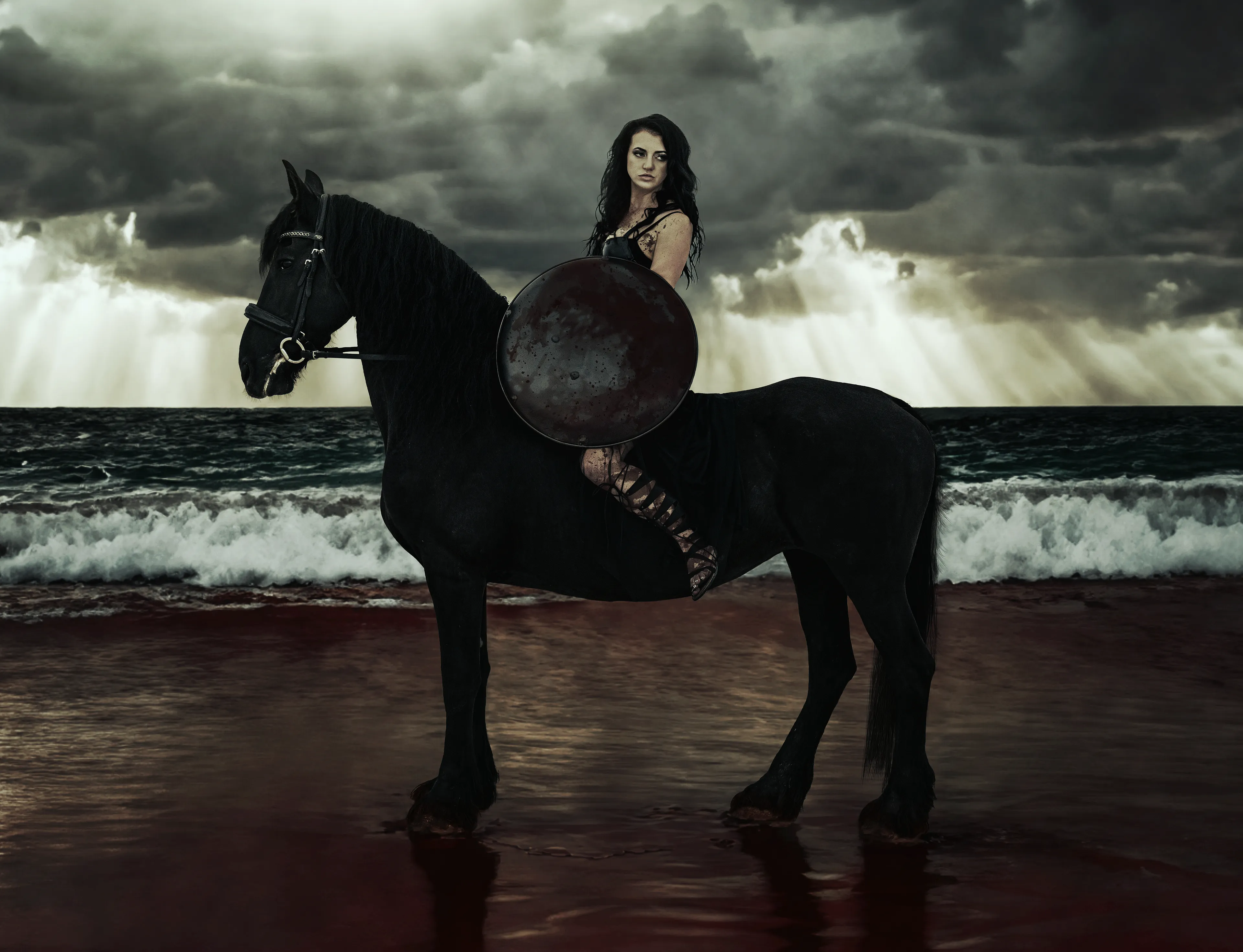 They were thirsty, so we gave them something to drink. A beach runs red, but the rains and sea will wash it away. 

Inspired by the iconic cliff scene of 300, this image is a fusion of photography, paint and digital compositing.  This photo was 2 years in the making and required me to ride bareback in armor holding a shield. It is not for the faint of heart, but for the brave.