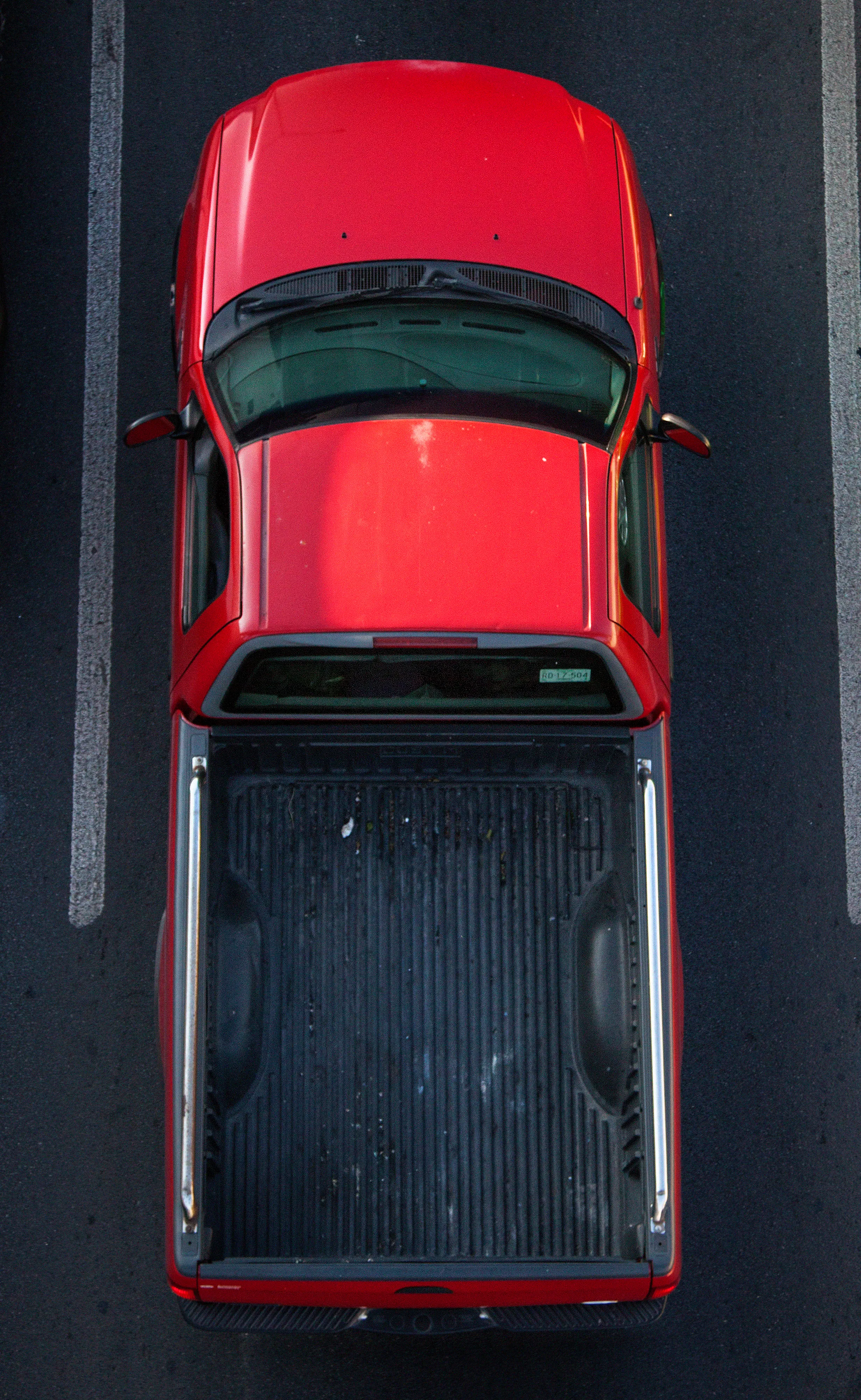 In Urban Transportation, Cartagena focuses on various modes of transportation used by workers in urban environments, particularly highlighting the ubiquitous red trucks. Shooting cars and trucks as they drive to work in the morning, Cartagena has been able to capture a stunning snapshot of what is the daily routine of a city. The colors and textures of the vehicles and objects, mixed with the contemporary idea of customizing vehicles make for arresting imagery of a contemporary Mexican city.