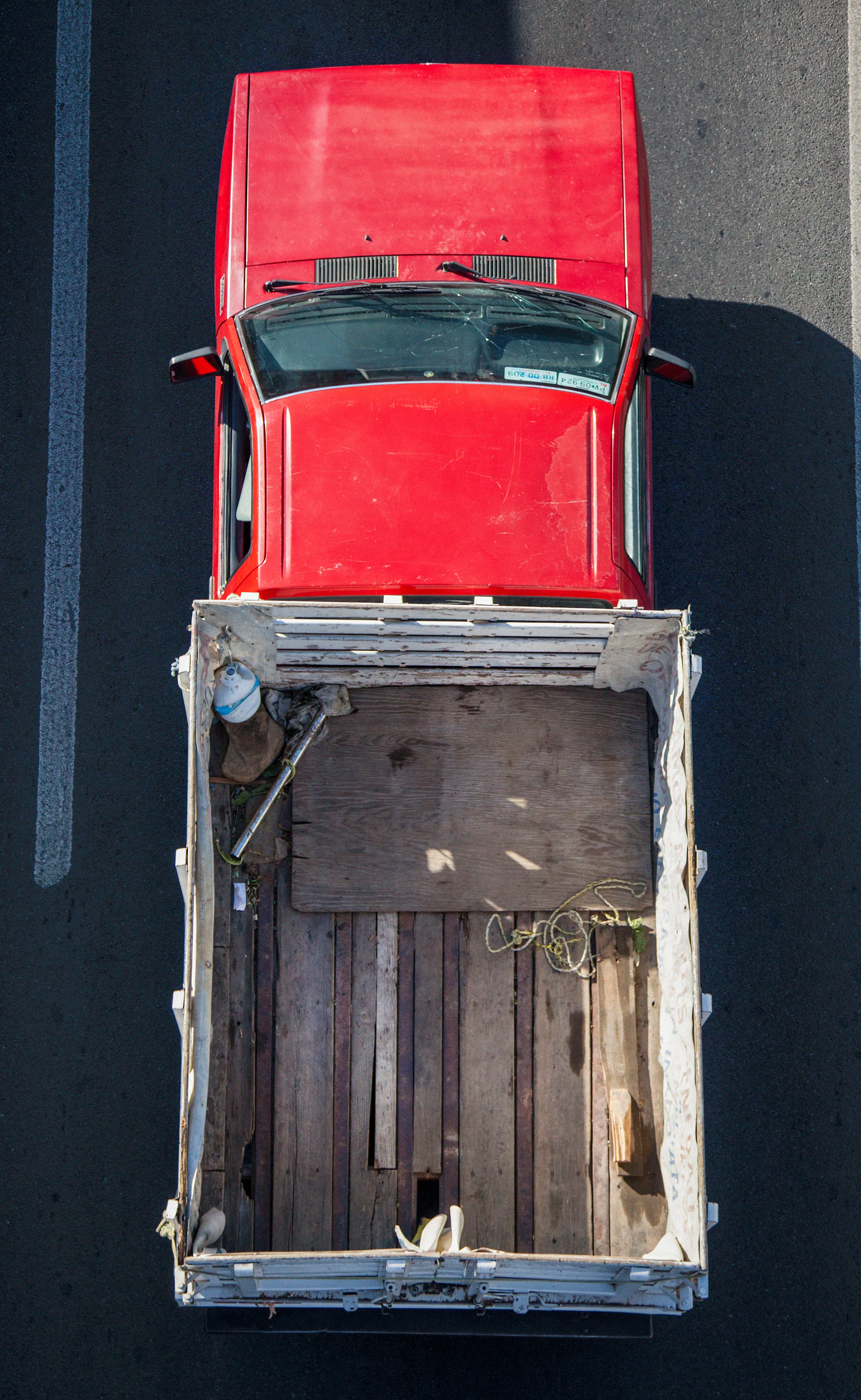 In Urban Transportation, Cartagena focuses on various modes of transportation used by workers in urban environments, particularly highlighting the ubiquitous red trucks. Shooting cars and trucks as they drive to work in the morning, Cartagena has been able to capture a stunning snapshot of what is the daily routine of a city. The colors and textures of the vehicles and objects, mixed with the contemporary idea of customizing vehicles make for arresting imagery of a contemporary Mexican city.