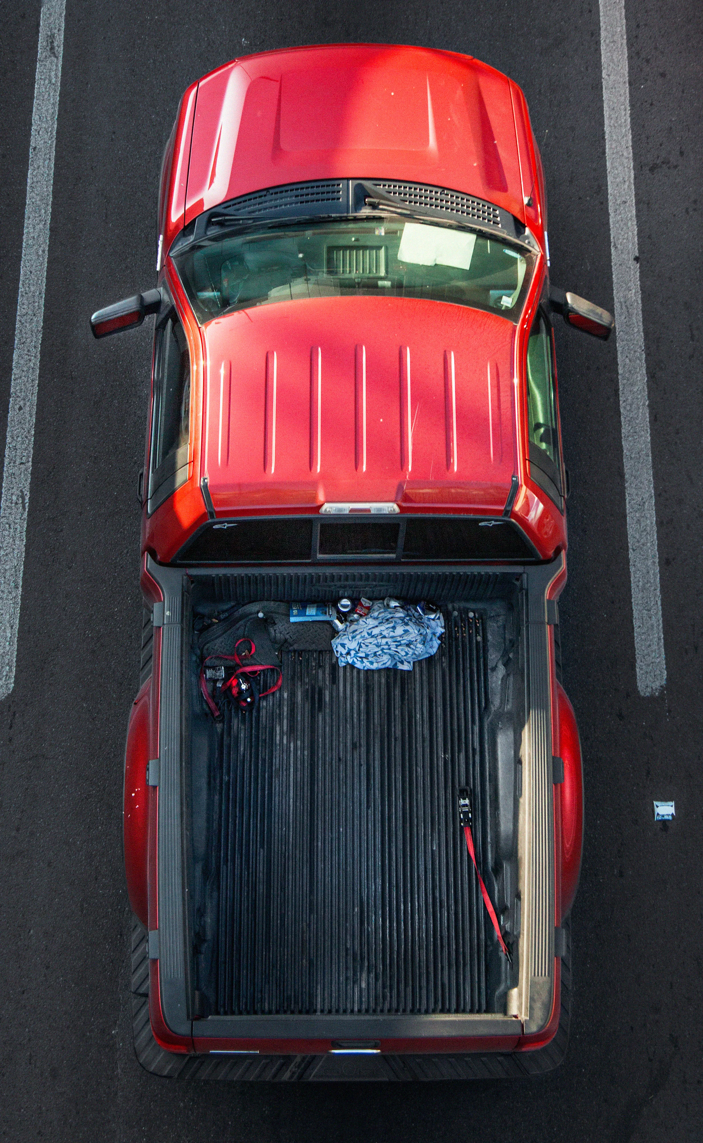 In Urban Transportation, Cartagena focuses on various modes of transportation used by workers in urban environments, particularly highlighting the ubiquitous red trucks. Shooting cars and trucks as they drive to work in the morning, Cartagena has been able to capture a stunning snapshot of what is the daily routine of a city. The colors and textures of the vehicles and objects, mixed with the contemporary idea of customizing vehicles make for arresting imagery of a contemporary Mexican city.