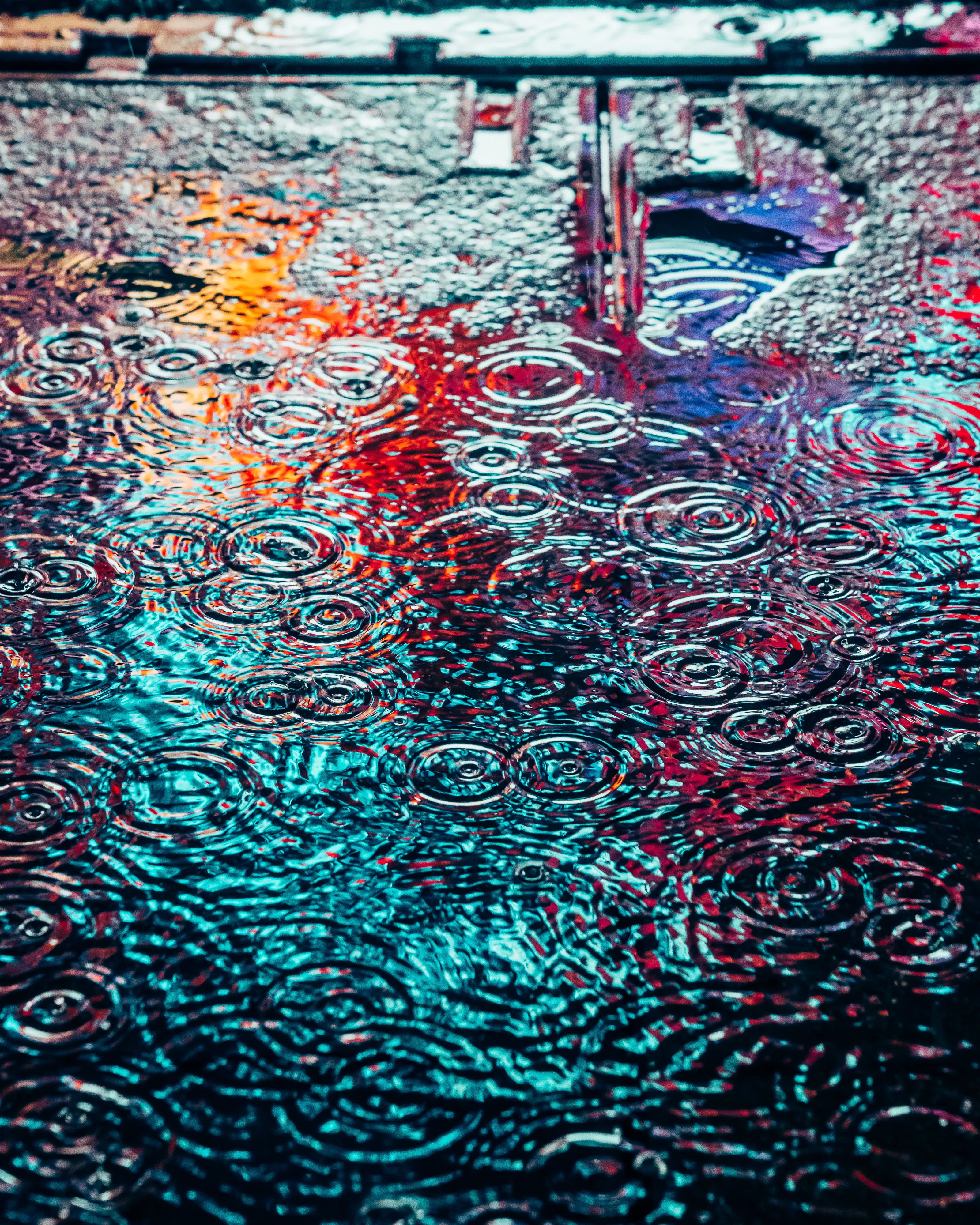 Drip Drop is an ode to the generative beauty of a universe unwinding. 1111 1/1 photographs of rain hitting puddles in Times Square, New York City. Rarity is determined by machine vision detecting a wide range of variables.