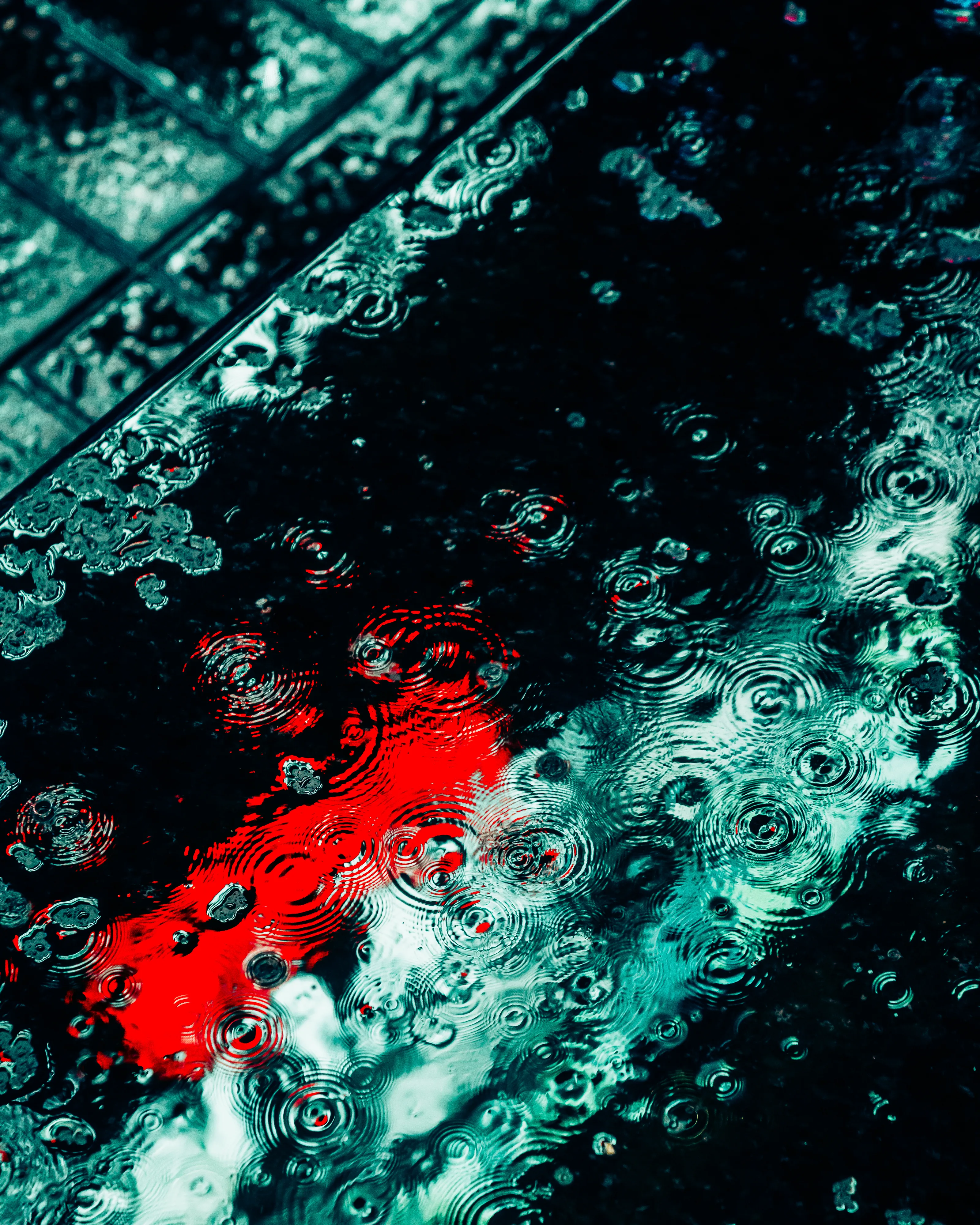 Drip Drop is an ode to the generative beauty of a universe unwinding. 1111 1/1 photographs of rain hitting puddles in Times Square, New York City. Rarity is determined by machine vision detecting a wide range of variables.