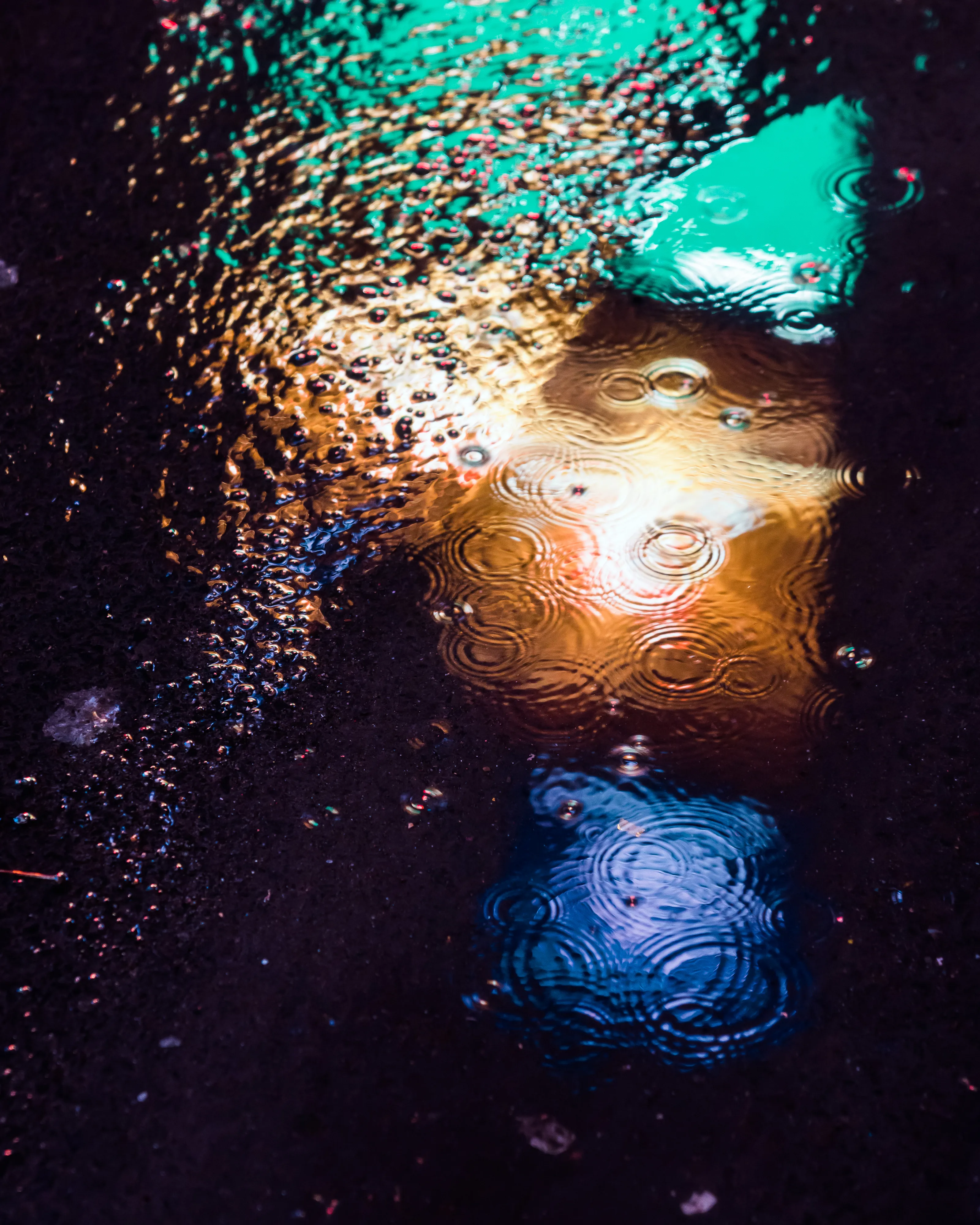 Drip Drop is an ode to the generative beauty of a universe unwinding. 1111 1/1 photographs of rain hitting puddles in Times Square, New York City. Rarity is determined by machine vision detecting a wide range of variables.