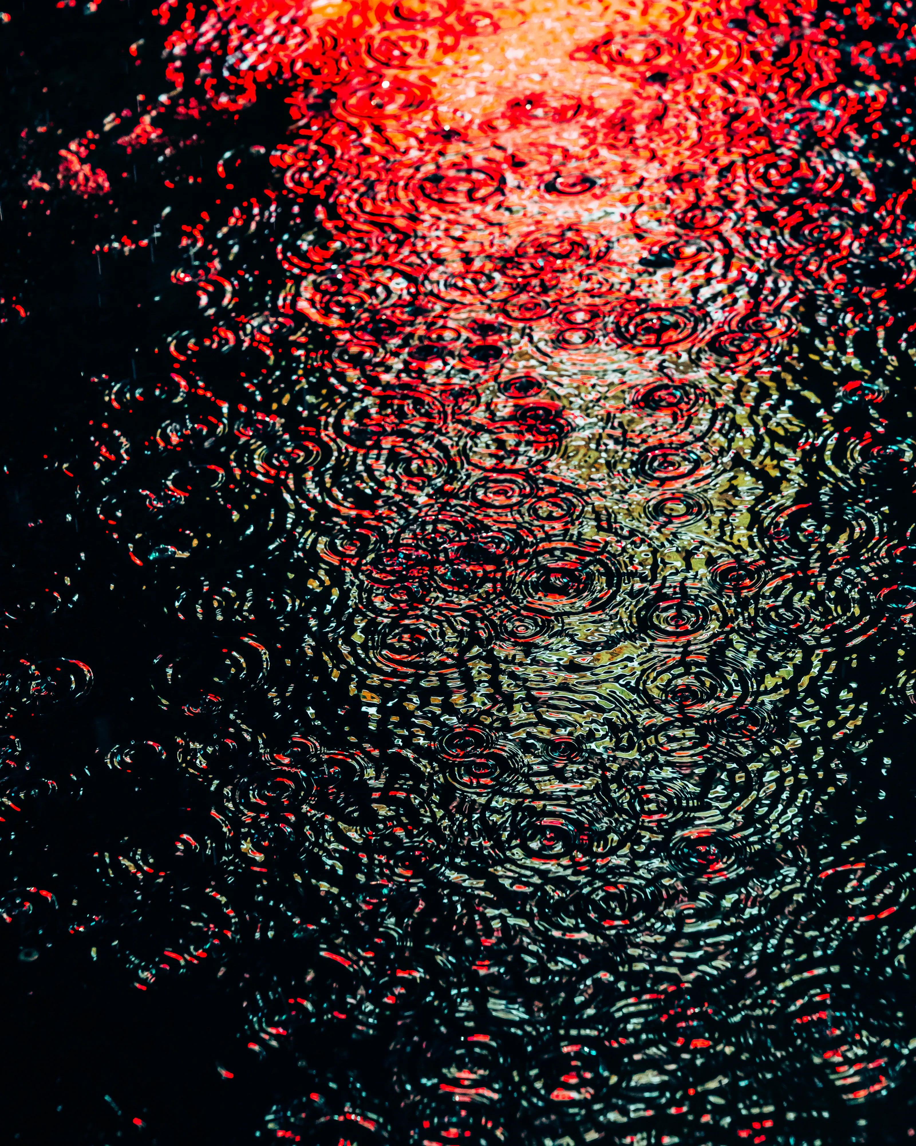 Drip Drop is an ode to the generative beauty of a universe unwinding. 1111 1/1 photographs of rain hitting puddles in Times Square, New York City. Rarity is determined by machine vision detecting a wide range of variables.