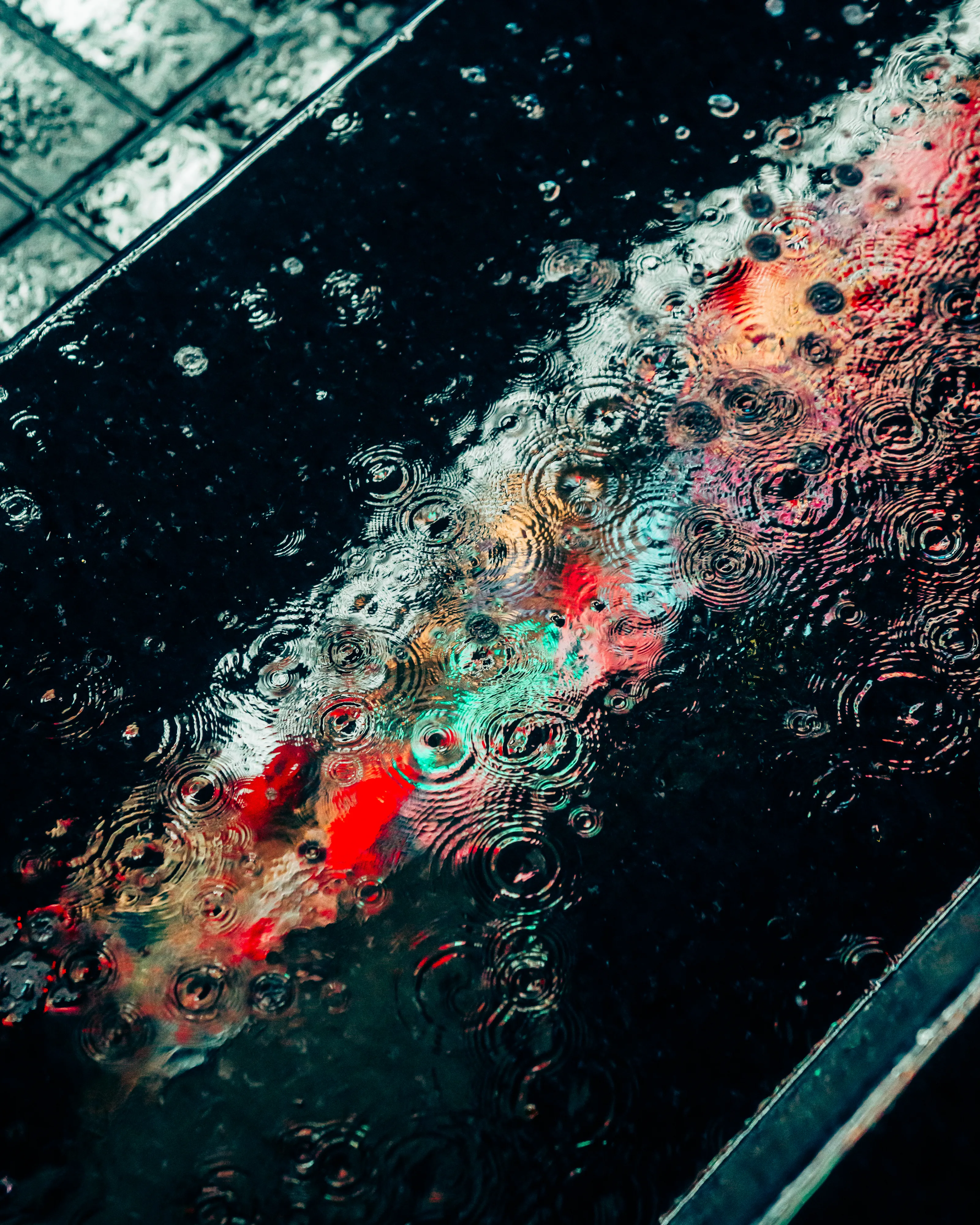 Drip Drop is an ode to the generative beauty of a universe unwinding. 1111 1/1 photographs of rain hitting puddles in Times Square, New York City. Rarity is determined by machine vision detecting a wide range of variables.