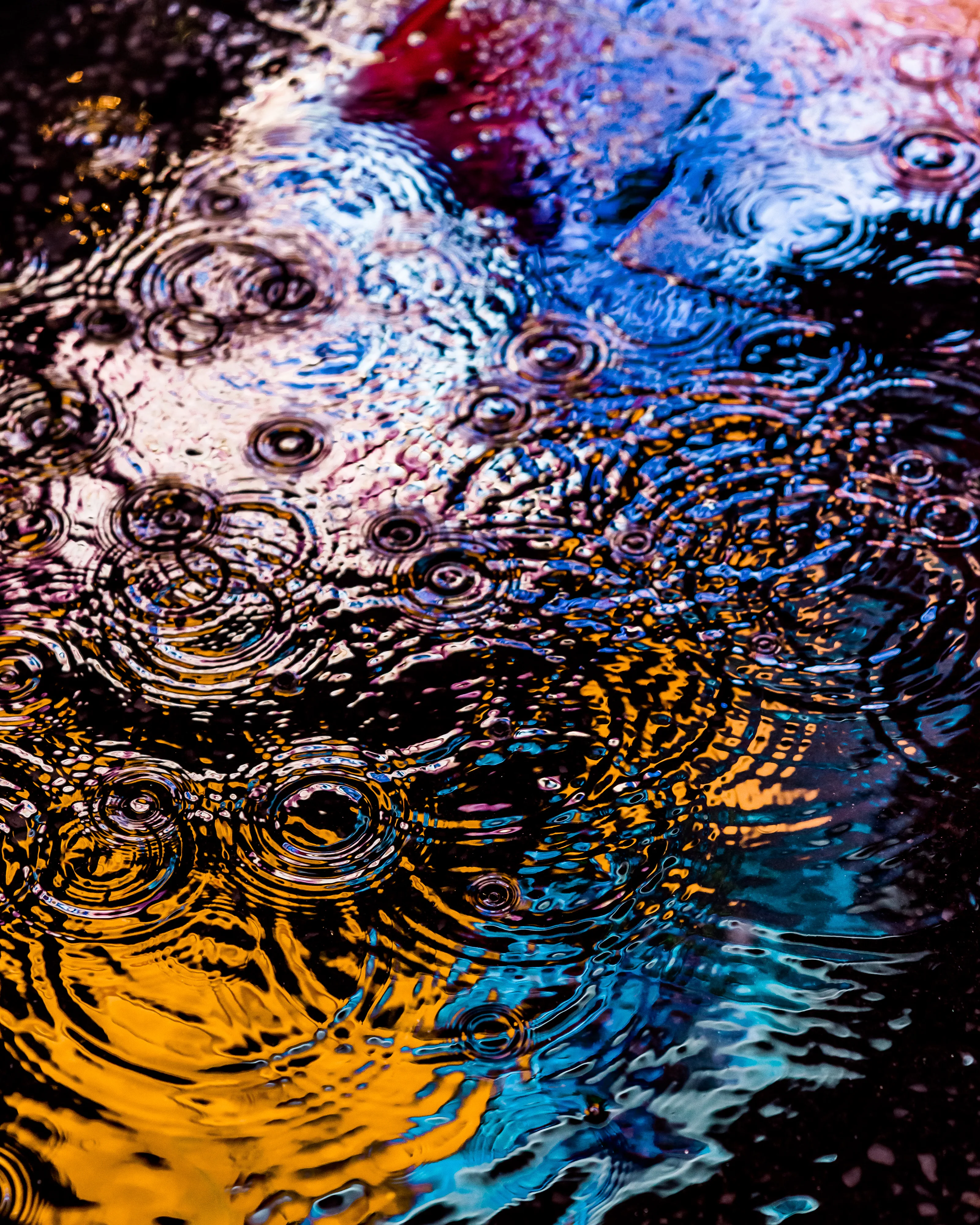 Drip Drop is an ode to the generative beauty of a universe unwinding. 1111 1/1 photographs of rain hitting puddles in Times Square, New York City. Rarity is determined by machine vision detecting a wide range of variables.