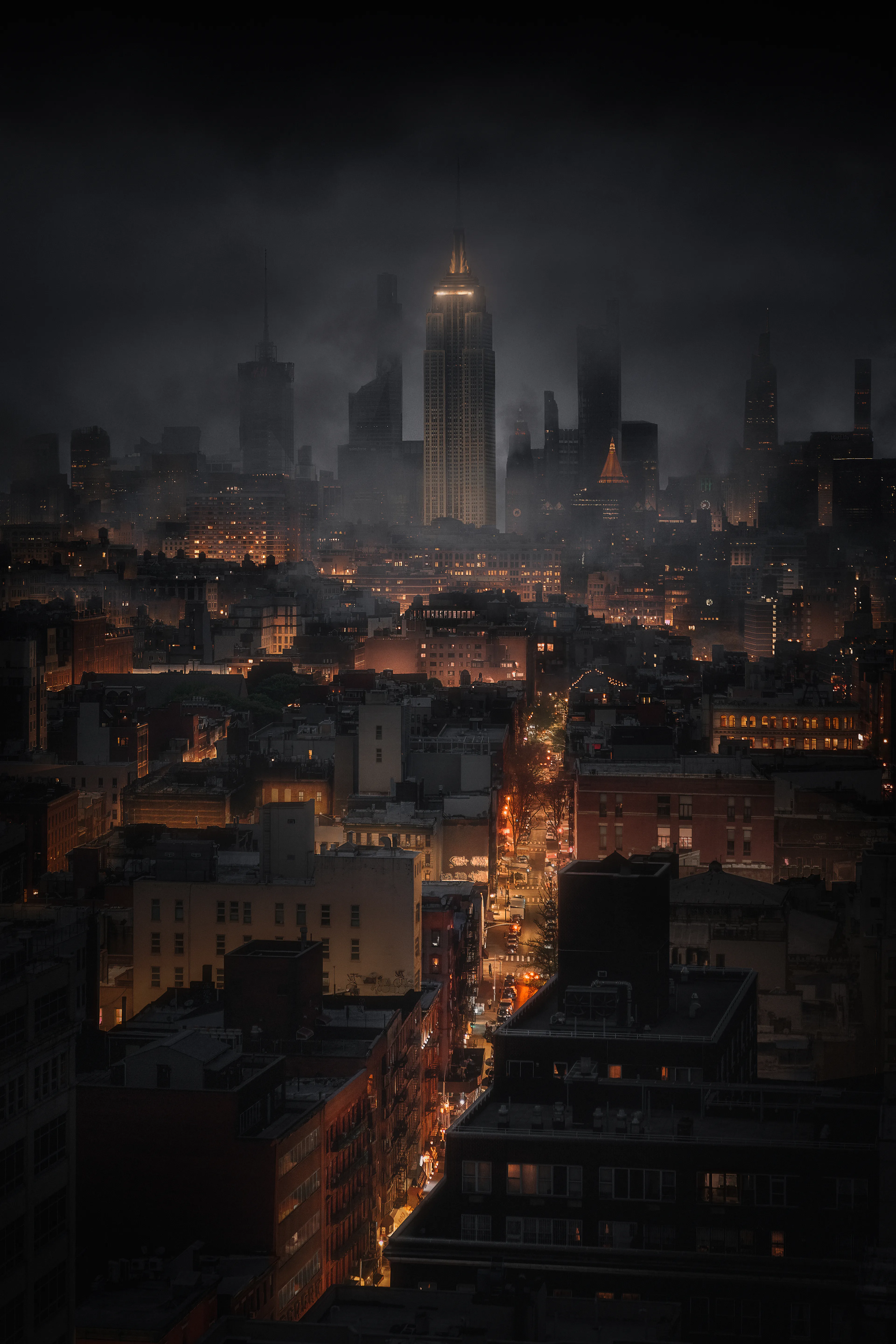 The city lay beneath a blanket of grey, its buildings obscured by a misty haze, creating an air of mystery. The once vibrant cityscape now seemed subdued, the hustle and bustle of the day replaced by a quiet melancholy. Yet even in this veiled atmosphere, the lights of the city still shone like diamonds, beckoning those who sought to bask in their glow. I couldn't help but feel that this was the perfect setting for a story of love and loss, of ambition and disillusionment. This was New York City where anything was possible.