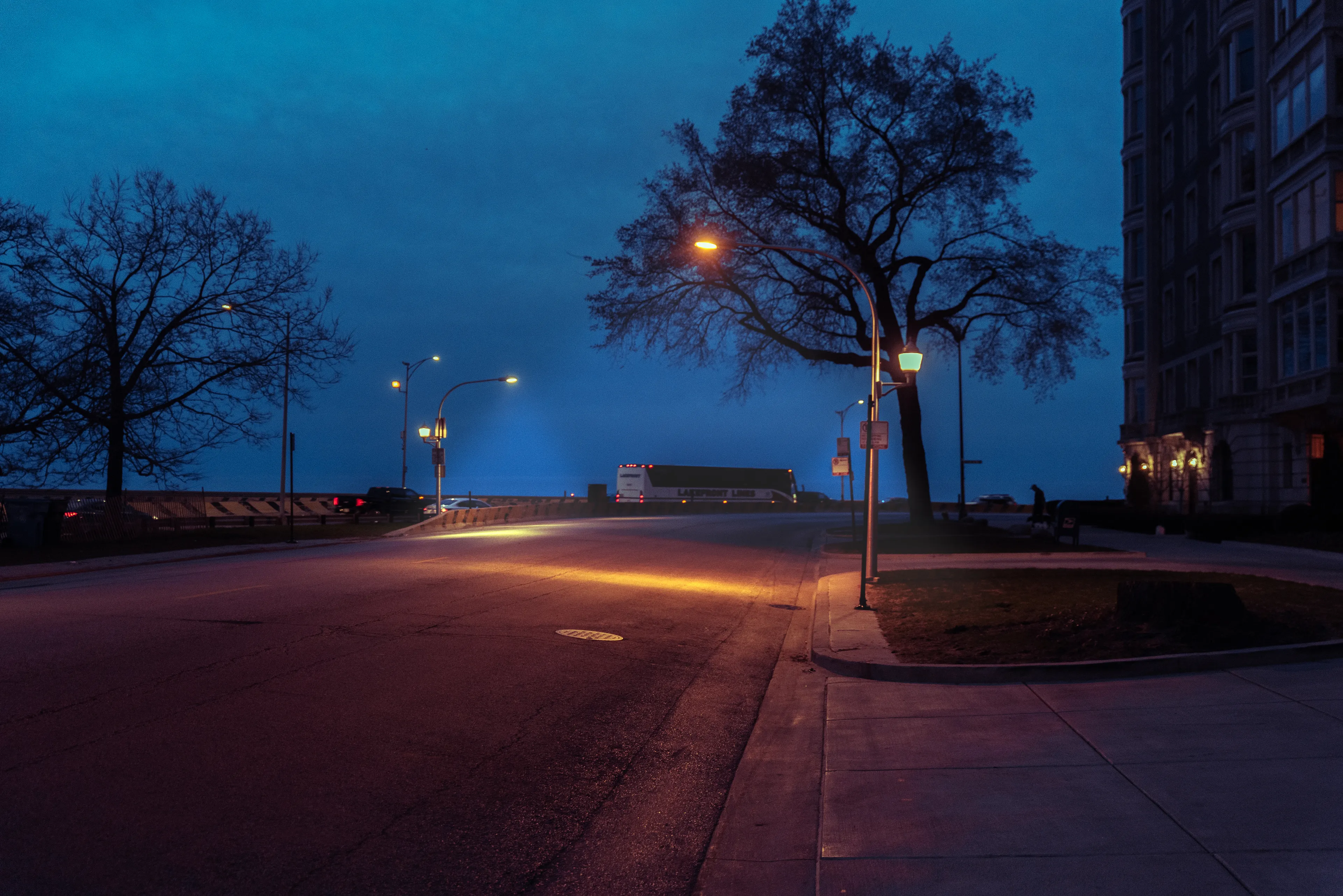 The hours right before the sun comes up in Chicago are incredibly blue, contrasted to the scattered light temperatures of the street lights I've always found it inspiring.