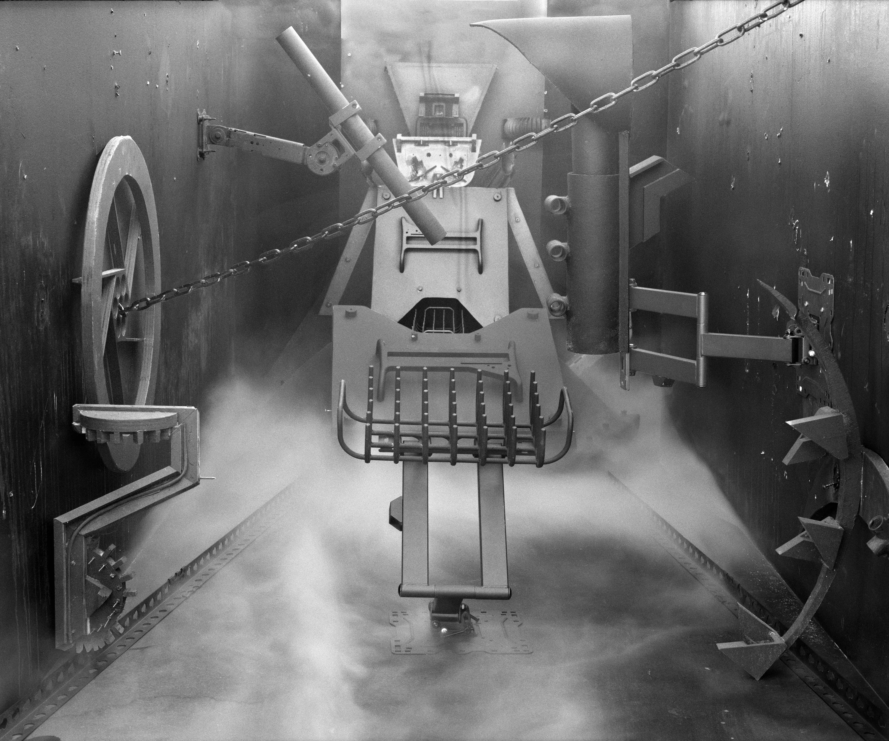 In conjunction with the exhibition in our physical gallery, Assembly presents “Afterwork” by Rodrigo Valenzuela. Based on the ghostly absence of workers in an indeterminate time and place, this work is at once futuristic and harking back to a century ago.

In staged sets suggesting abandoned factories, Valenzuela wishfully foments a revolution, enabling workers powerless in the face of relentless international movement of capital to flee or perhaps overrun their workplaces. As in a science-fiction universe where we feel a potential reality just out of reach of our present, Valenzuela’s scenes meld mechanical objects with steam or smoke, suggestive of steel manufacturing, a cloud of sweat-the only bodily proof of human toil-or a cinematic trope of futuristic atmosphere. In these eerily depopulated scenes, viewers are prompted to envision alternative possibilities to histories of workers dispossessed, or made obsolete, and industries that thrived on human pain.

Rodrigo Valenzuela is a Chilean-born, Los Angeles-based artist working in photography, video, painting, and installation. Not satisfied with the existing romanticism of blight and resurrection, Valenzuela opts for image making that is defiantly labor intensive and ambitious in scope. Detritus and industrial parts are scavenged over time, taken apart or reassembled, and transformed in the artist's own studio backdrops, then turned into flat images that confuse the viewer with scale shifts and multiple references. Using autobiographical threads to inform larger universal fields of experience, his work constructs narratives, scenes, and stories that point to the tensions found between the individual and communities. Much of his work deals with the experience of undocumented immigrants and laborers. His work has been exhibited internationally, including solo exhibitions at Lisa Kandlhofer Galerie, Vienna; the Ulrich Museum of Art, Wichita, KS; the Art Museum of the University of Memphis, TN; Klowdenmann Gallery, Los Angeles; the Frye Art Museum, Seattle; and Museo de Arte Contemporaneo, Santiago, Chile. In 2021, Valenuzlea was awarded a Guggenheim Fellowship in Photography and Smithsonian Artist Research Fellowship.