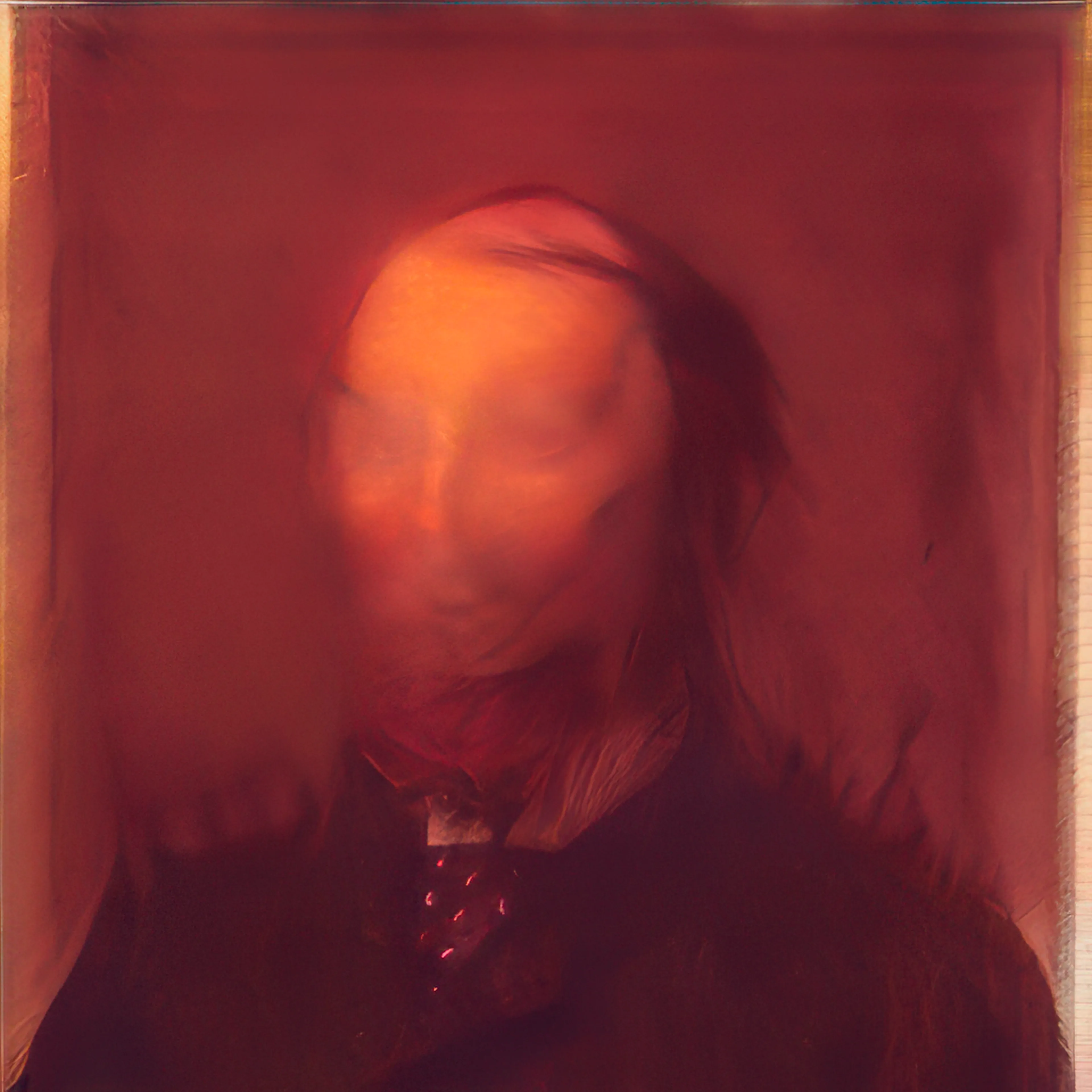 **CycleGAN Makeover (2017)**
In CycleGAN Makeover, Klingemann turns the emerging tool of CycleGAN toward questions of portraiture, identity, and machine bias. Created in 2017, this series explores the AI-mediated transformation of gender in photographic images - a kind of automated drag act performed by neural networks. CycleGAN, a new generative model that learns to translate images from one domain to another without paired examples, provided the flexibility to reimagine gender. Seizing on this potential, Klingemann trained CycleGAN on two carefully prepared domains: one of female portraits and one of male portraits. By teaching the system to convert an image from one set to the other, he created a model capable of morphing faces across the gender divide. The process was akin to an AI “makeover”: feed in a photo of a woman, and out emerges a version with masculine features; feed in a man, and the network feminizes his appearance.
What makes this undertaking compelling are the cultural and representational questions it raises. The AI was not explicitly instructed on what “male” or “female” means, it deduced patterns from its training data, encapsulating prevalent visual stereotypes. The resulting portraits mirror societal biases as the machine subtly adjusts features - smoothing or lightening skin, altering jawlines, and modifying hair or stubble - to produce transformations that are startling and often off-kilter. A face may emerge with features that almost pass as plausibly male or female, yet remain ambiguous with mismatched eyes or an eerie smile. Klingemann embraced these unexpected outcomes as artistic serendipity, applying his transhancement technique to magnify odd details and produce ghostly, uncanny portraits that flicker between genders.
These images carry a haunting, archival quality. By mining open archives of 19th-century photography to compile a dataset of vintage faces, Klingemann allowed modern AI to “repaint” anonymous figures of the past. Conceptually, the series engages with themes of fluid identity and the algorithmic gaze. In an era when algorithms increasingly mediate self-presentation, his work questions what it means when a machine reconstructs you according to its learned biases. CycleGAN Makeover stands as a fascinating study in machine bias and creativity, a visual exploration that blurs the line between male and female, provoking us to reconsider our preconceptions.