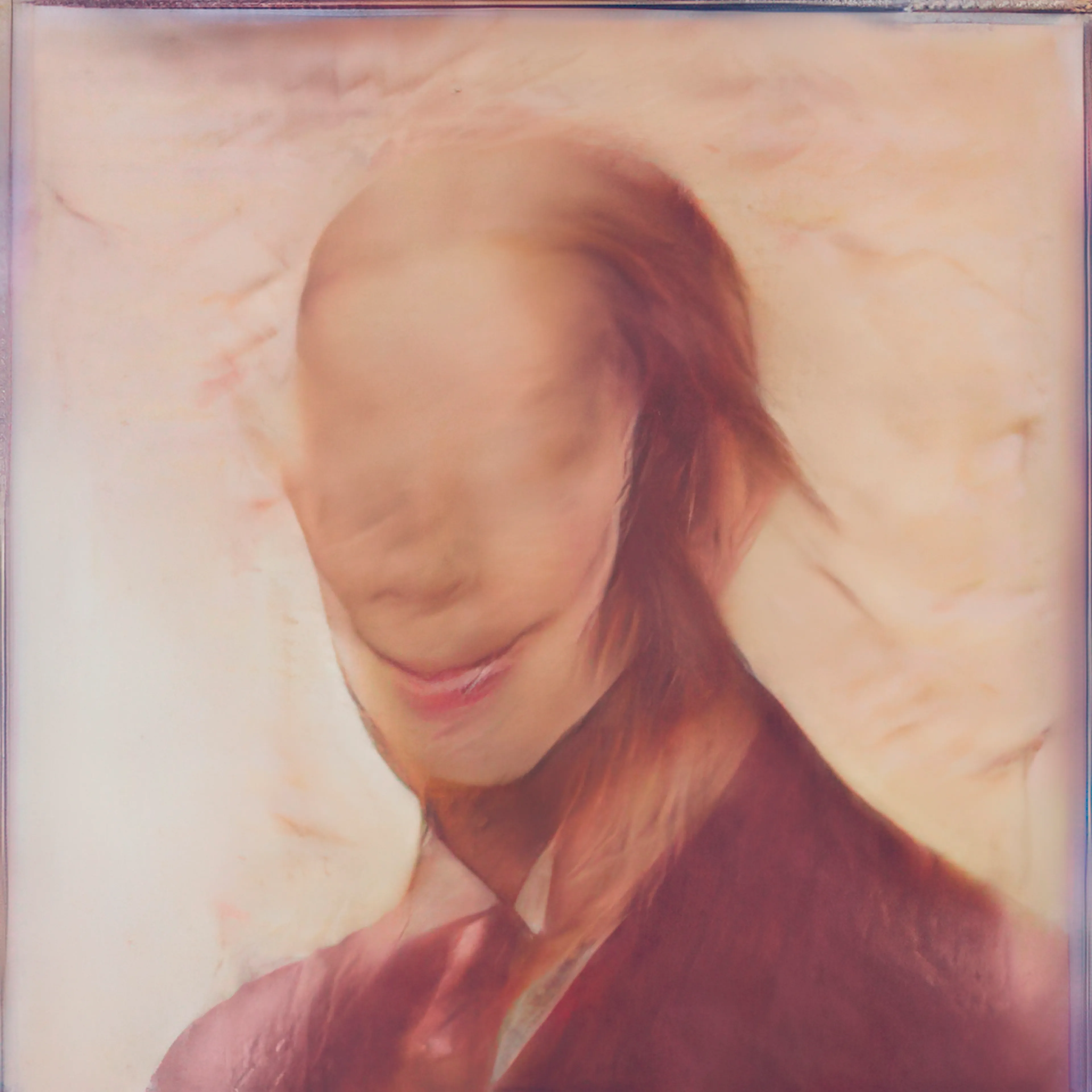 **CycleGAN Makeover (2017)**
In CycleGAN Makeover, Klingemann turns the emerging tool of CycleGAN toward questions of portraiture, identity, and machine bias. Created in 2017, this series explores the AI-mediated transformation of gender in photographic images - a kind of automated drag act performed by neural networks. CycleGAN, a new generative model that learns to translate images from one domain to another without paired examples, provided the flexibility to reimagine gender. Seizing on this potential, Klingemann trained CycleGAN on two carefully prepared domains: one of female portraits and one of male portraits. By teaching the system to convert an image from one set to the other, he created a model capable of morphing faces across the gender divide. The process was akin to an AI “makeover”: feed in a photo of a woman, and out emerges a version with masculine features; feed in a man, and the network feminizes his appearance.
What makes this undertaking compelling are the cultural and representational questions it raises. The AI was not explicitly instructed on what “male” or “female” means, it deduced patterns from its training data, encapsulating prevalent visual stereotypes. The resulting portraits mirror societal biases as the machine subtly adjusts features - smoothing or lightening skin, altering jawlines, and modifying hair or stubble - to produce transformations that are startling and often off-kilter. A face may emerge with features that almost pass as plausibly male or female, yet remain ambiguous with mismatched eyes or an eerie smile. Klingemann embraced these unexpected outcomes as artistic serendipity, applying his transhancement technique to magnify odd details and produce ghostly, uncanny portraits that flicker between genders.
These images carry a haunting, archival quality. By mining open archives of 19th-century photography to compile a dataset of vintage faces, Klingemann allowed modern AI to “repaint” anonymous figures of the past. Conceptually, the series engages with themes of fluid identity and the algorithmic gaze. In an era when algorithms increasingly mediate self-presentation, his work questions what it means when a machine reconstructs you according to its learned biases. CycleGAN Makeover stands as a fascinating study in machine bias and creativity, a visual exploration that blurs the line between male and female, provoking us to reconsider our preconceptions.