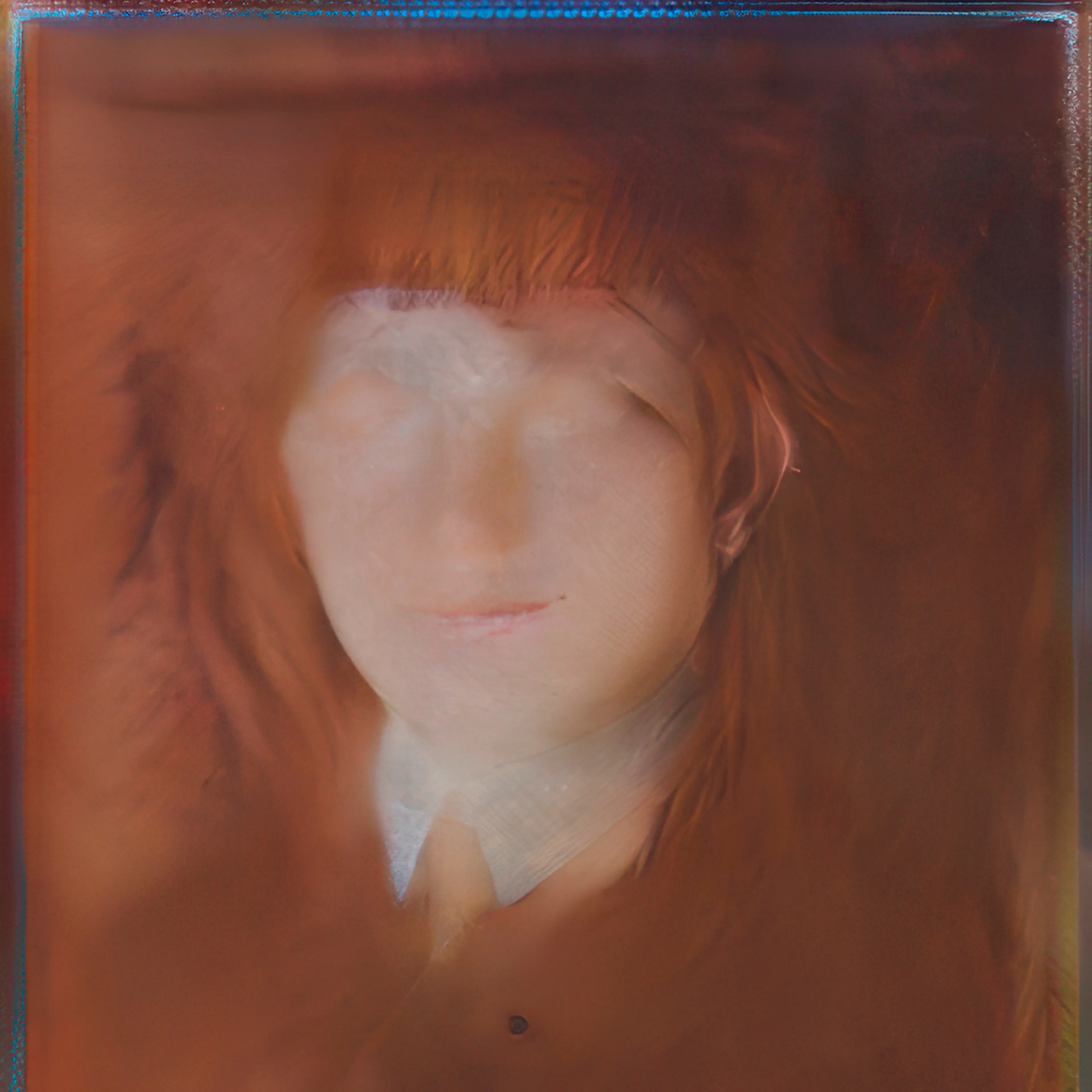 **CycleGAN Makeover (2017)**
In CycleGAN Makeover, Klingemann turns the emerging tool of CycleGAN toward questions of portraiture, identity, and machine bias. Created in 2017, this series explores the AI-mediated transformation of gender in photographic images - a kind of automated drag act performed by neural networks. CycleGAN, a new generative model that learns to translate images from one domain to another without paired examples, provided the flexibility to reimagine gender. Seizing on this potential, Klingemann trained CycleGAN on two carefully prepared domains: one of female portraits and one of male portraits. By teaching the system to convert an image from one set to the other, he created a model capable of morphing faces across the gender divide. The process was akin to an AI “makeover”: feed in a photo of a woman, and out emerges a version with masculine features; feed in a man, and the network feminizes his appearance.
What makes this undertaking compelling are the cultural and representational questions it raises. The AI was not explicitly instructed on what “male” or “female” means, it deduced patterns from its training data, encapsulating prevalent visual stereotypes. The resulting portraits mirror societal biases as the machine subtly adjusts features - smoothing or lightening skin, altering jawlines, and modifying hair or stubble - to produce transformations that are startling and often off-kilter. A face may emerge with features that almost pass as plausibly male or female, yet remain ambiguous with mismatched eyes or an eerie smile. Klingemann embraced these unexpected outcomes as artistic serendipity, applying his transhancement technique to magnify odd details and produce ghostly, uncanny portraits that flicker between genders.
These images carry a haunting, archival quality. By mining open archives of 19th-century photography to compile a dataset of vintage faces, Klingemann allowed modern AI to “repaint” anonymous figures of the past. Conceptually, the series engages with themes of fluid identity and the algorithmic gaze. In an era when algorithms increasingly mediate self-presentation, his work questions what it means when a machine reconstructs you according to its learned biases. CycleGAN Makeover stands as a fascinating study in machine bias and creativity, a visual exploration that blurs the line between male and female, provoking us to reconsider our preconceptions.