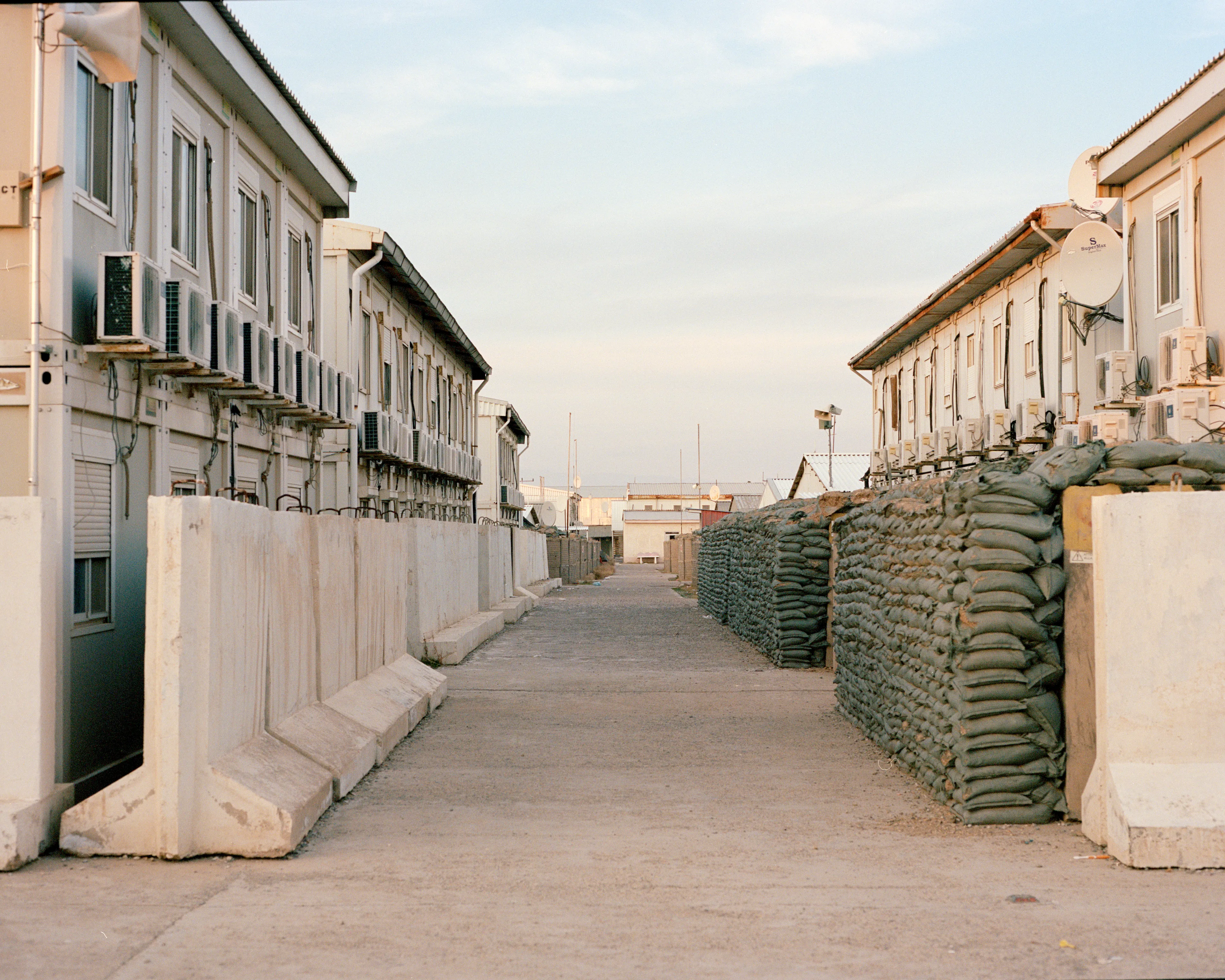 The Kabuler #14 by Lorenzo Meloni

AFGHANISTAN. Herat. January 2022. Soldiers' dwellings inside the Camp arena base, a military base once occupied by the US, Italian and Spanish armies and now recaptured by the Taliban.

Afghanistan has been one of the most documented regions in the world for the last two decades, yet it remains a big mystery for the general audience who finds it hard to grasp the complete picture behind the constant reporting of breaking news.

This collection of 55 NFT is the first part of “The Kabuler” project, in which Lorenzo Meloni partners with Cristina de Middel to produce a full panoramic photograph of the current situation of the country, borrowing the treatment that the media provide to other destinations and topics that are not under constant scrutiny. 

The project will use the sections of a traditional magazine to propose a complete overview of Afghanistan with an editorial structure, that should prevent the audience from falling again into dramatic expectations.

Edition: 1 of 1

Commissioned by Obscura
