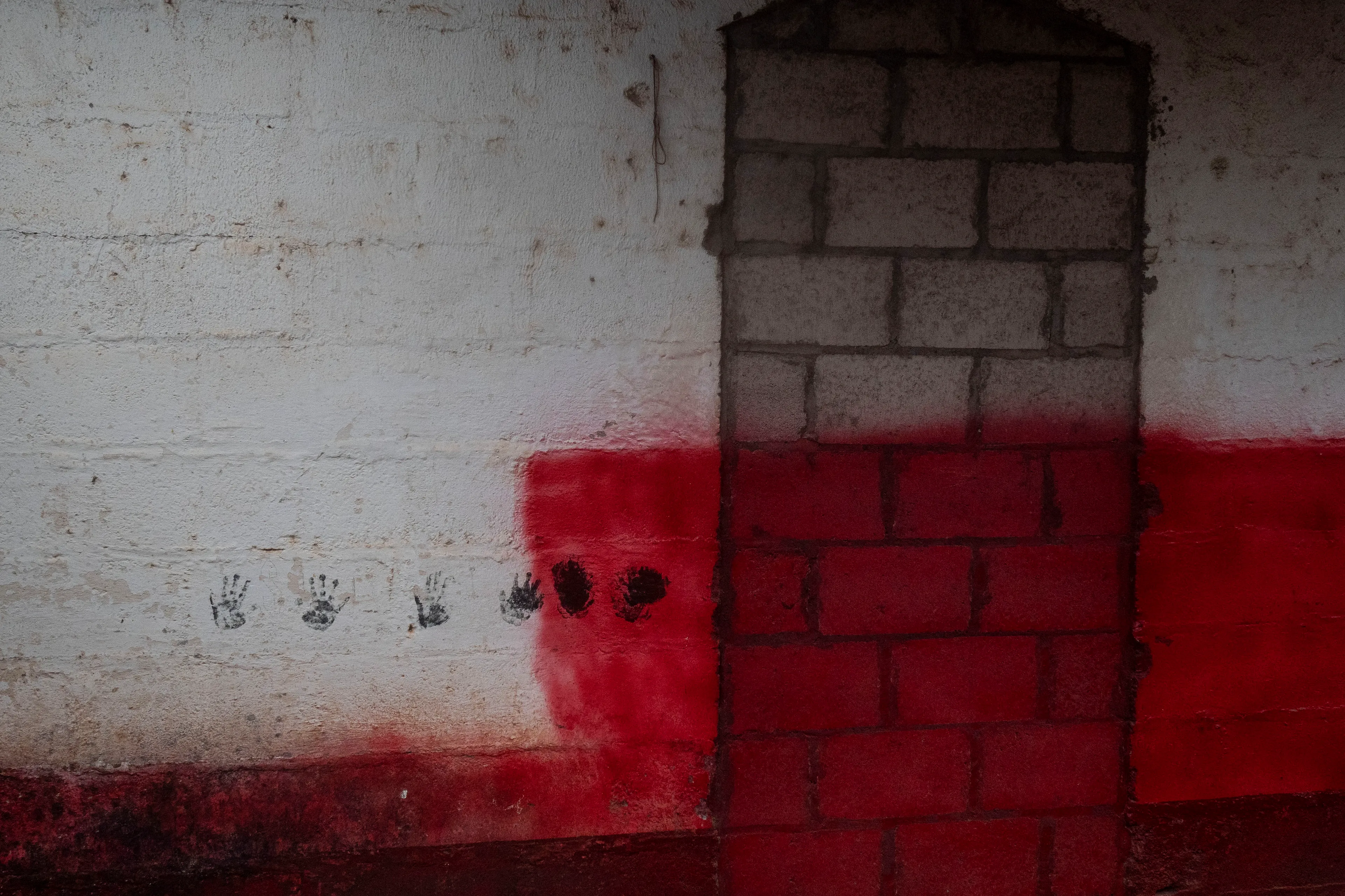 « Bitcoin Nation » #28 by Thomas Dworzak

EL SALVADOR, Perquin / El Mozote, 2022/3-4. Museum commemorating the Front Farabundo Martí de libération nationale FMLN, the leftwing groups fighting in the Salvadorian civil war. Former rebel stronghold and site of the Mozote massacre.

« Bitcoin Nation » - El Salvador - Thomas Dworzak / Magnum Photos

Many photographers and journalists of my generation, interested in war and conflict, would at one point read Richard Kapusciznsky's all-time classic "The Soccer War" and watch Oliver Stone's "Salvador. » The latternow feels insanely cheesy. With the country's troubled history in mind and never having been to Central America, I found "Bitcoin Nation - El Salvador" a challenging theme to explore for this NFT project. 

I set out to straightforwardly document this alien and invisible world of bitcoin, and being 'in the realm of crypto,' I hoped it would give me access to President Nayib Bukele's surprise project. Last year he had suddenly declared Bitcoin the official currency of El Salvador - which until now was only the US dollar. The 40-year-old president of Palestinian origin started out as an anti-establishment candidate, describing himself as "the world's coolest dictator," but soon took an authoritarian turn. Yet he continues drumming the bitcoin beat, and bitcoin celebrities from all around the world keep flocking to El Salvador.
The Pacific beach town of El Zonte became "Bitcoin Beach," and "Volcano Bonds" and "Bitcoin City" are meant to be the future.

When official doors remained closed for me, I started digging for clues in the county's troubled past and present or anything, even remotely, related to the bitcoin world. Vignettes of the bloody civil war regularly popped up, and I came across a few "bitcoin events." The sudden spike of almost a hundred homicides in the course of one weekend in late March, due to what seemed a breakdown of a secret deal between the government and the two main gangs, had President Bukele declare a state of emergency, martial law and intensify the war on the gangs. I could see fringes of it. But nothing compared to the brutality of
the spectacularly filmed daily government propaganda videos of mass arrests and more-than-rough prisoner handlings I watched on TV, Twitter, and Instagram.

It was at a small bitcoin event that I found a hint why I may have been shunned and didn't get any access to show the "shiny world of Bitcoin Nation," as I had hoped. My NFT ticket was definitely the "wrong church" in the Bitcoin world. To paraphrase one of the speakers: "If I want to gamble, I go to Vegas and party with beautiful hookers, instead of being a loser, sitting around in my basement, frustrated, minting NFTs. Shitcoins."

El Salvador and the President were meant to be guests of honor at the Bitcoin 2022 conference in Miami. But due to the internal tension, he canceled the visit, and the 30+ thousand delegates had to discuss the future of bitcoin without him.

Edition: 1 of 1

Commissioned by Obscura