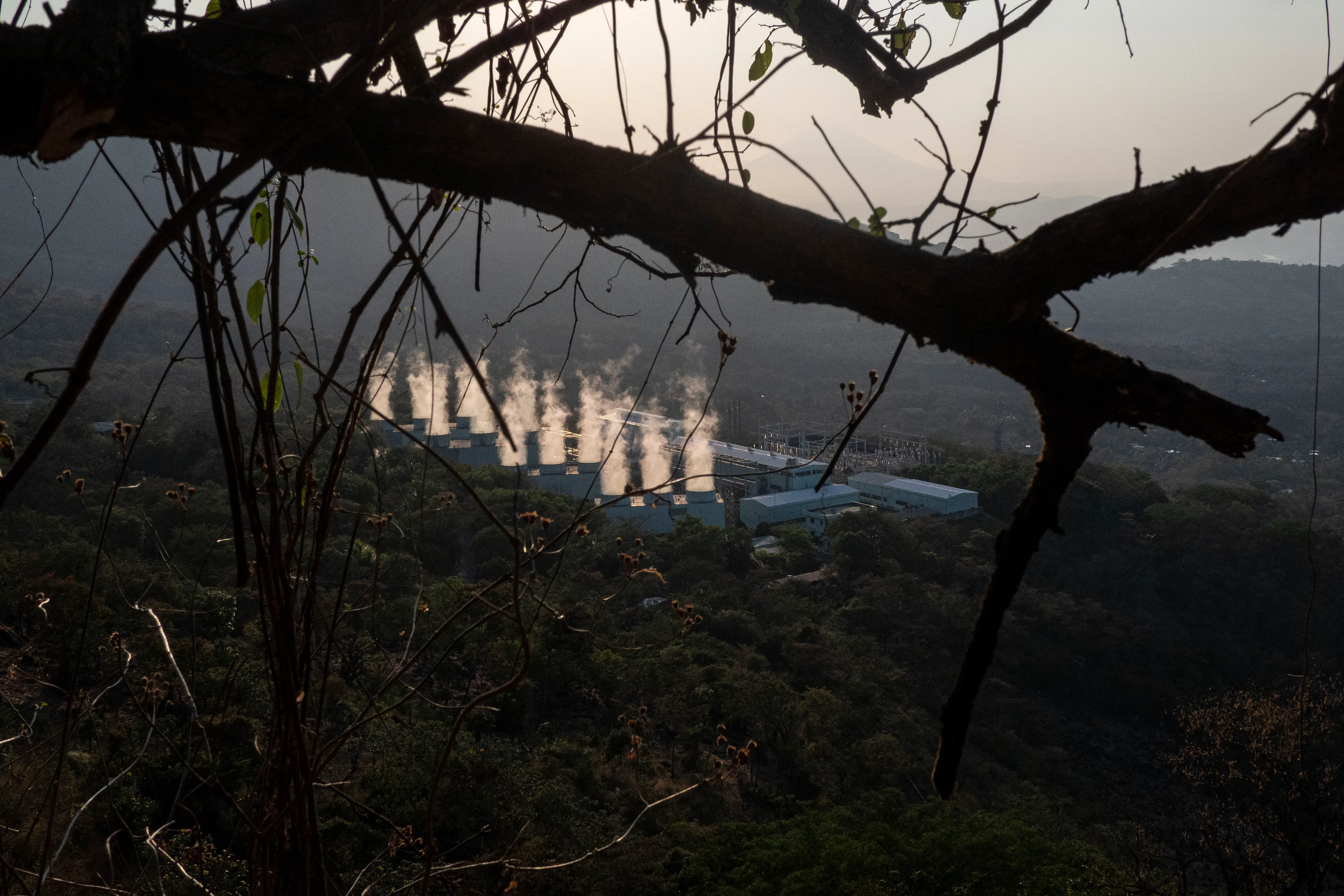 « Bitcoin Nation » #29 by Thomas Dworzak

EL SALVADOR, Berlin, 2022/3-4. Geothermal power plant which is supposed to be a key element in the future of Bitcoins in EL SALVADOR.

« Bitcoin Nation » - El Salvador - Thomas Dworzak / Magnum Photos

Many photographers and journalists of my generation, interested in war and conflict, would at one point read Richard Kapusciznsky's all-time classic "The Soccer War" and watch Oliver Stone's "Salvador. » The latternow feels insanely cheesy. With the country's troubled history in mind and never having been to Central America, I found "Bitcoin Nation - El Salvador" a challenging theme to explore for this NFT project. 

I set out to straightforwardly document this alien and invisible world of bitcoin, and being 'in the realm of crypto,' I hoped it would give me access to President Nayib Bukele's surprise project. Last year he had suddenly declared Bitcoin the official currency of El Salvador - which until now was only the US dollar. The 40-year-old president of Palestinian origin started out as an anti-establishment candidate, describing himself as "the world's coolest dictator," but soon took an authoritarian turn. Yet he continues drumming the bitcoin beat, and bitcoin celebrities from all around the world keep flocking to El Salvador.
The Pacific beach town of El Zonte became "Bitcoin Beach," and "Volcano Bonds" and "Bitcoin City" are meant to be the future.

When official doors remained closed for me, I started digging for clues in the county's troubled past and present or anything, even remotely, related to the bitcoin world. Vignettes of the bloody civil war regularly popped up, and I came across a few "bitcoin events." The sudden spike of almost a hundred homicides in the course of one weekend in late March, due to what seemed a breakdown of a secret deal between the government and the two main gangs, had President Bukele declare a state of emergency, martial law and intensify the war on the gangs. I could see fringes of it. But nothing compared to the brutality of
the spectacularly filmed daily government propaganda videos of mass arrests and more-than-rough prisoner handlings I watched on TV, Twitter, and Instagram.

It was at a small bitcoin event that I found a hint why I may have been shunned and didn't get any access to show the "shiny world of Bitcoin Nation," as I had hoped. My NFT ticket was definitely the "wrong church" in the Bitcoin world. To paraphrase one of the speakers: "If I want to gamble, I go to Vegas and party with beautiful hookers, instead of being a loser, sitting around in my basement, frustrated, minting NFTs. Shitcoins."

El Salvador and the President were meant to be guests of honor at the Bitcoin 2022 conference in Miami. But due to the internal tension, he canceled the visit, and the 30+ thousand delegates had to discuss the future of bitcoin without him.

Edition: 1 of 1

Commissioned by Obscura
