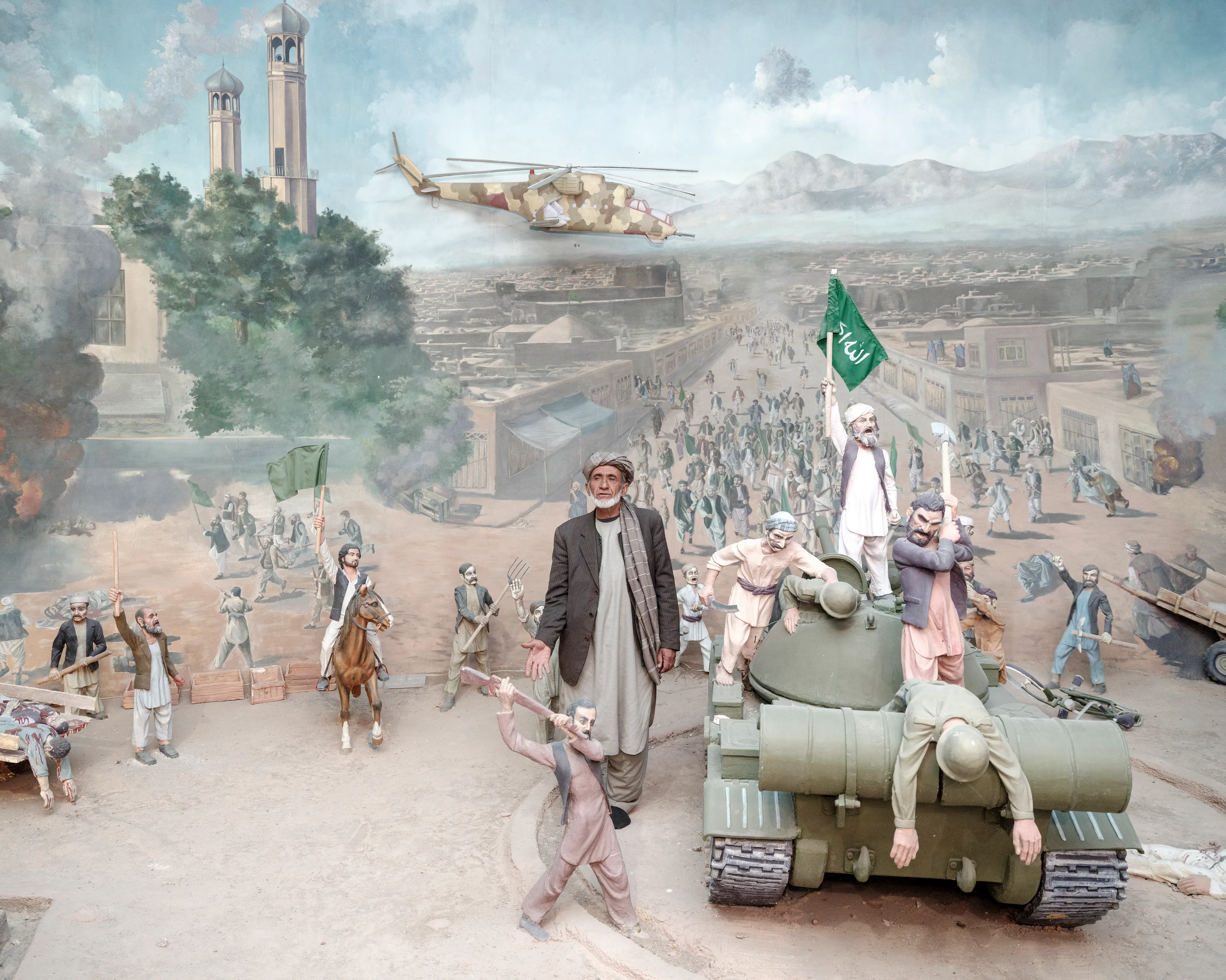The Kabuler #13 by Lorenzo Meloni

AFGHANISTAN. Herat. January 2022.  Jihad Museum. The museum's caretaker Seyed Hassan Qatali, a former Mujahideen, between the reproduction of a battle against the Red Army in which he fought.

Afghanistan has been one of the most documented regions in the world for the last two decades, yet it remains a big mystery for the general audience who finds it hard to grasp the complete picture behind the constant reporting of breaking news.

This collection of 55 NFT is the first part of “The Kabuler” project, in which Lorenzo Meloni partners with Cristina de Middel to produce a full panoramic photograph of the current situation of the country, borrowing the treatment that the media provide to other destinations and topics that are not under constant scrutiny. 

The project will use the sections of a traditional magazine to propose a complete overview of Afghanistan with an editorial structure, that should prevent the audience from falling again into dramatic expectations.

Edition: 1 of 1

Commissioned by Obscura