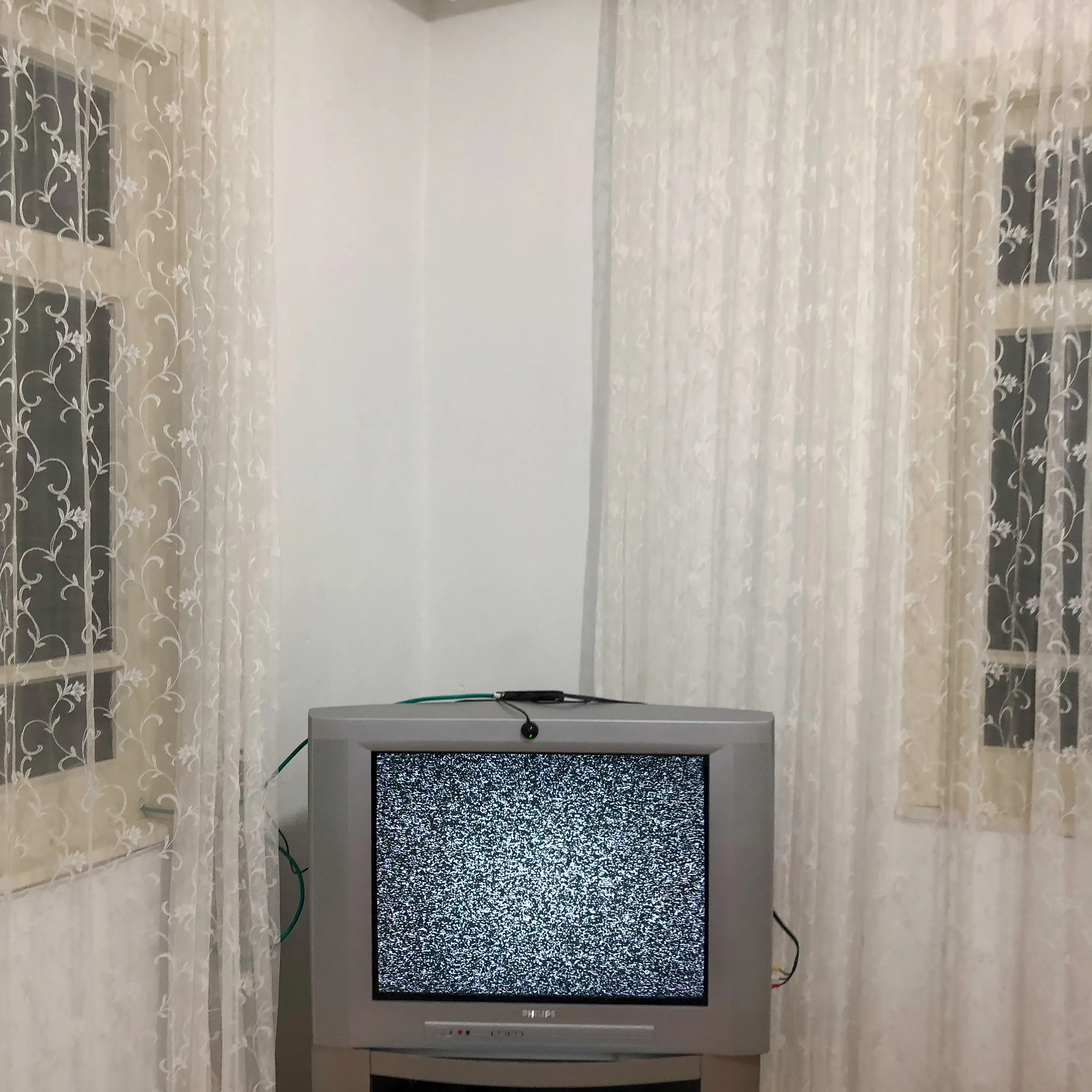 Transfiguration #4 by Sabiha Çimen

A room with no T.V. signal. Rize, Turkey.

The impetus of this project grew out of my first book Hafız, about young girls who are memorizing Quran in schools through-out Turkey. Some marry and have children soon after graduation, but some rebel and transform themselves in a radical way; Şeyma is one of those stories of Transfiguration.

This is a world known to me because I too studied in a Quran school with my twin sister in Istanbul when I was younger.  When I returned to do my first long term photographic project l sought out familiar scenes and objects from my memory there and it was there that I met Şeyma and her unique and radical ways.

My projects usually deal with the Art of Resistance within my close circle of friends and family. In my last project the young girls' trivialities and playfulness took center stage, and now as these girls enter into adulthood they are faced with living in a world of male dominance. Sometimes, as with Şeyma, there is a need for revenge with their new found power over men and their money and habits; an inner strength coming from raw female intellect, and sexuality. 

This time my project not only focuses on the girls stories, but lies within the context of a large city- Istanbul, with its multiple layers and meanings. l am trying to provide the viewer cause and effect by viewing the different strata simultaneously and between. In the story Şeyma l am portraying her world, her fantasies, her fears, hidden love stories, songs and signs, ancient traditions, religious black-outs, and her continued spirituality that was never lost even through her Transfiguration. 


Edition: 1 of 1

Commissioned by Obscura