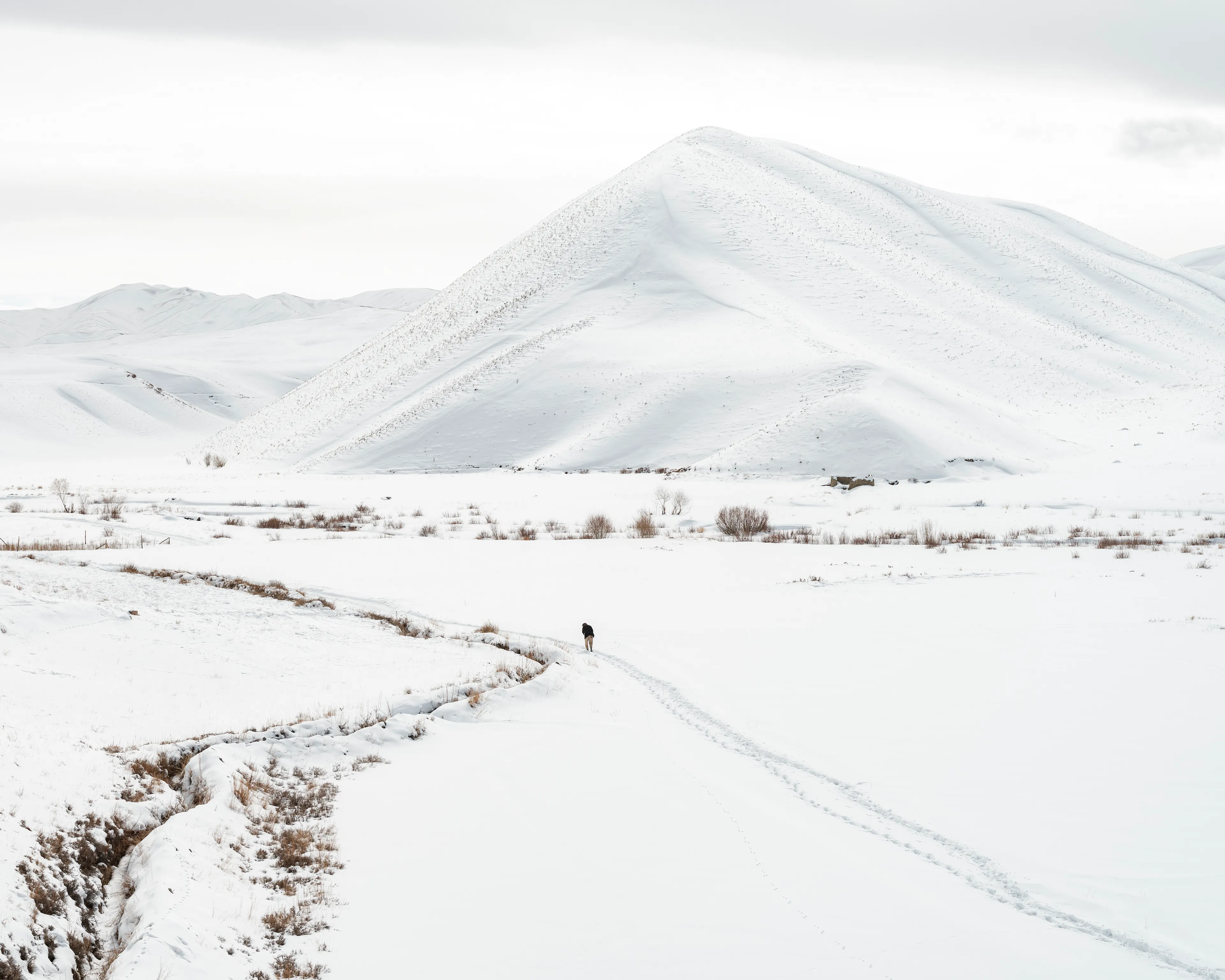 The Kabuler #5 by Lorenzo Meloni

AFGHANISTAN. Area around Jedachel. January 2022.  A man walks through the snow to reach a small village.

Afghanistan has been one of the most documented regions in the world for the last two decades, yet it remains a big mystery for the general audience who finds it hard to grasp the complete picture behind the constant reporting of breaking news.

This collection of 55 NFT is the first part of “The Kabuler” project, in which Lorenzo Meloni partners with Cristina de Middel to produce a full panoramic photograph of the current situation of the country, borrowing the treatment that the media provide to other destinations and topics that are not under constant scrutiny. 

The project will use the sections of a traditional magazine to propose a complete overview of Afghanistan with an editorial structure, that should prevent the audience from falling again into dramatic expectations.

Edition: 1 of 1

Commissioned by Obscura