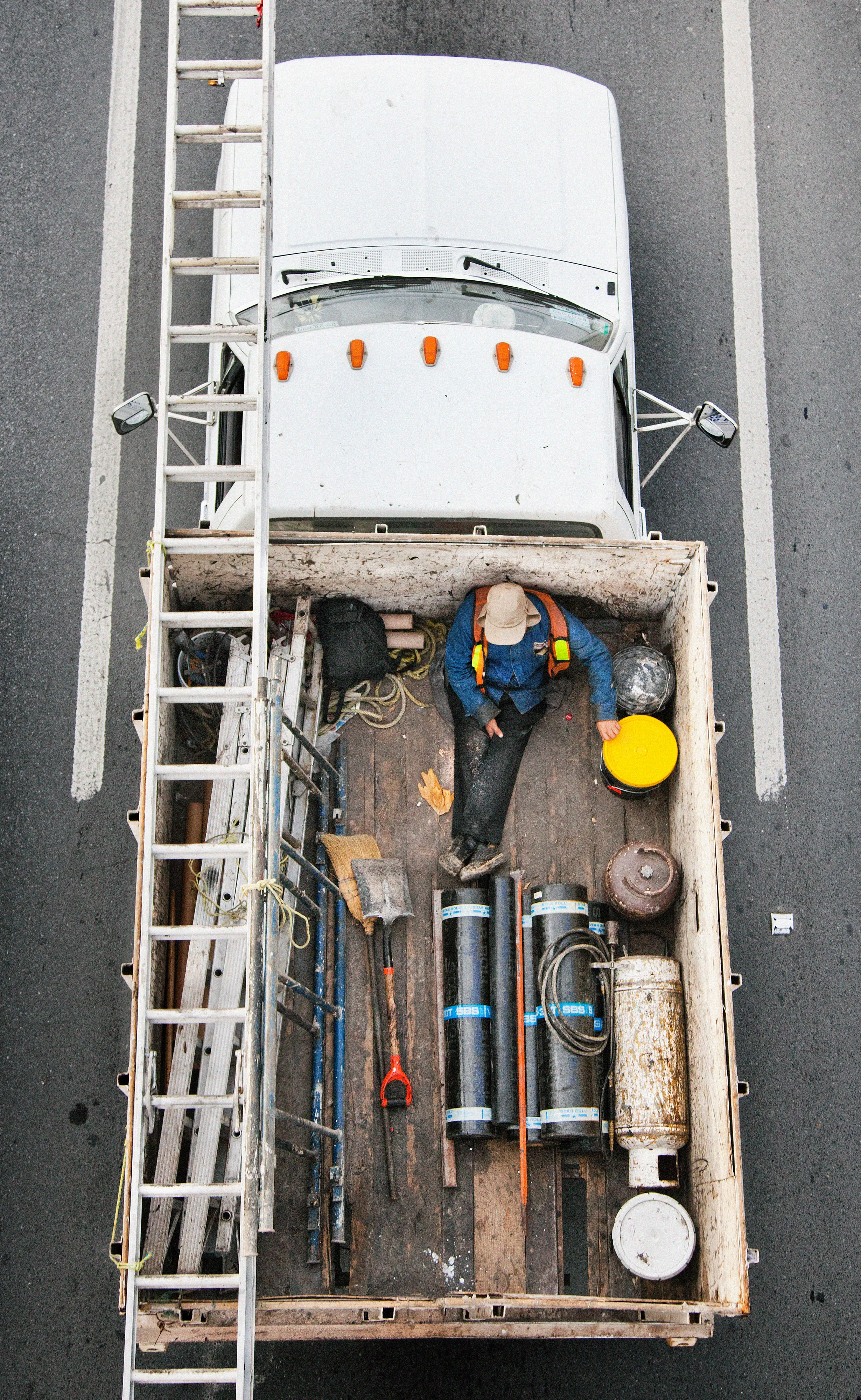 This photograph is part of my series, Carpoolers, which depicts laborers in México captured from an overpass, commuting between distant suburbs and urban centers. Like much of my work, this project comes from a desire to tell the story of the dramatic environmental, economic, and demographic changes playing out in my home city of Monterrey. This series has circulated the internet since 2011 and has been exhibited widely around the world.