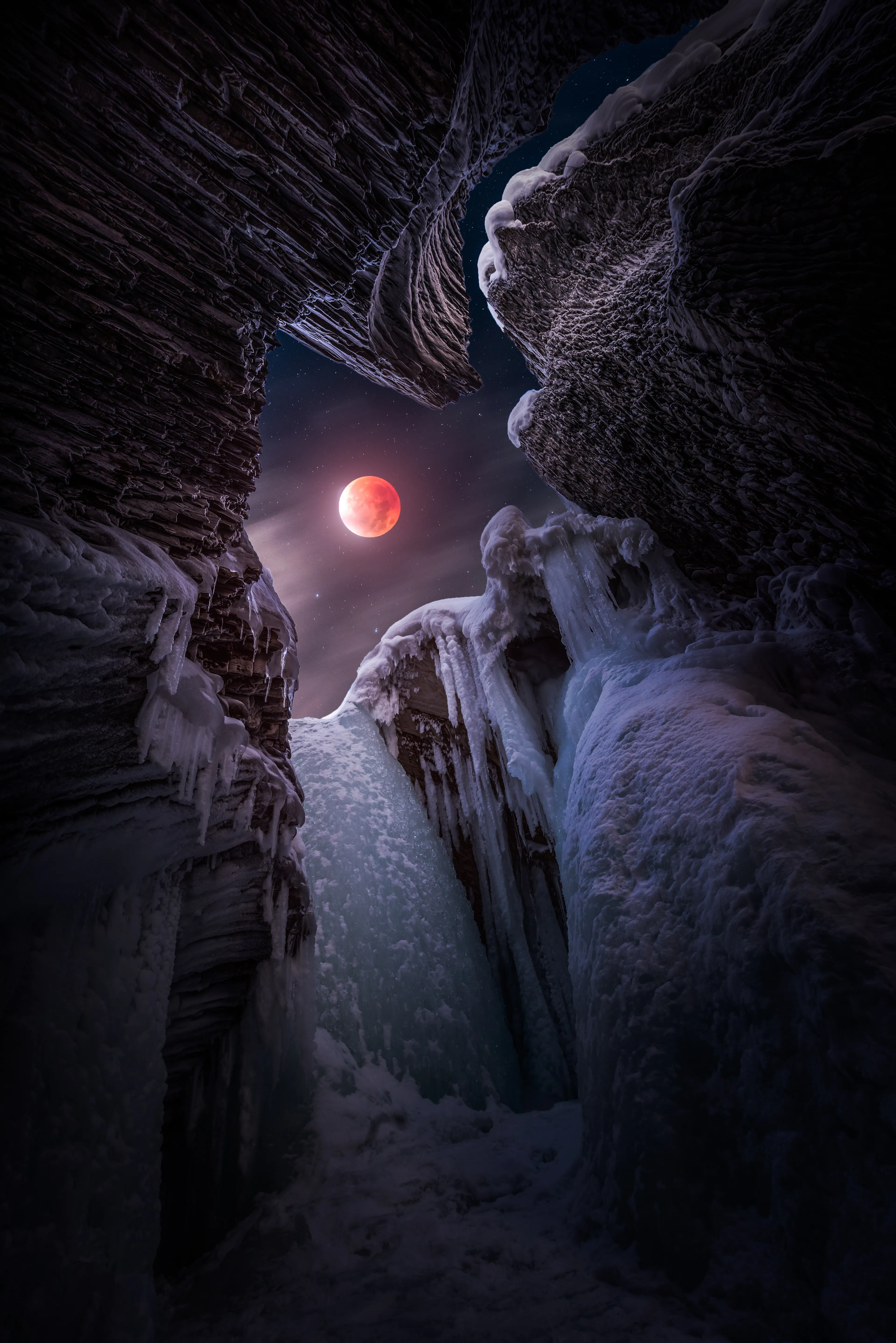 An image I made from the very depths of my creative vision. During the lunar eclipse blood moon a few years ago I was able to shoot the elements needed to put this final piece together I had envisioned for some time. Using multiple exposures to execute  my vision this piece is the final result.

Image Size 4912x7360