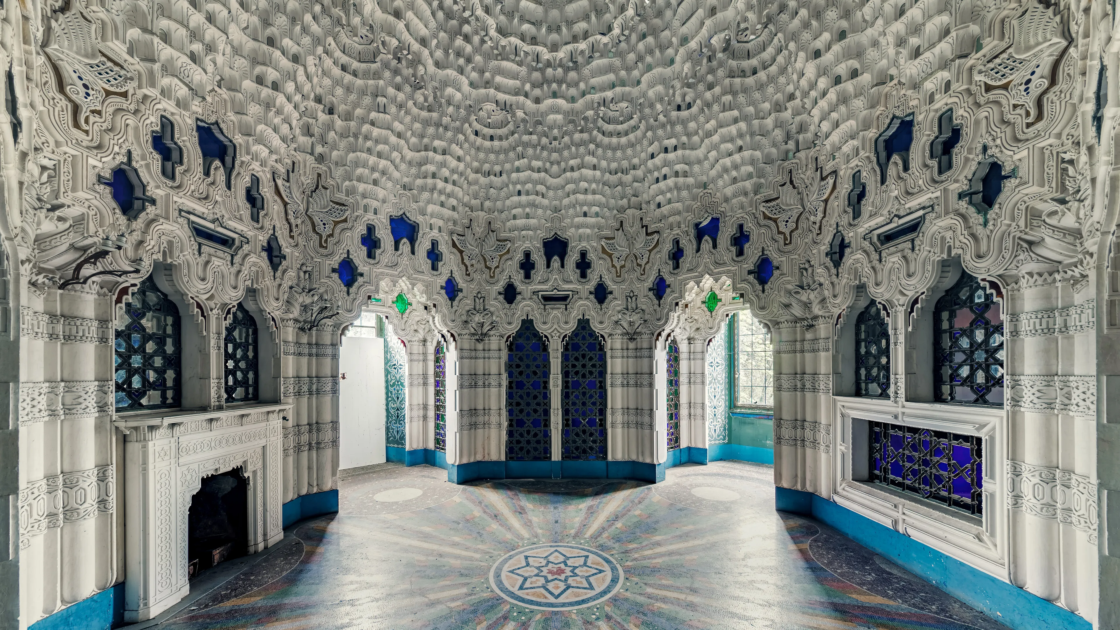 One of 365 rooms in the abandoned Castello di Sammezzano. 365 rooms, one for every day. And no two are the same. But no one has lived in any of these rooms for over 11,000 days. 

The Castello di Sammezzano, a magnificent oriental-style castle, is located in Tuscany, Italy. It was built in the 17th century, with most of its now familiar shape created in the 19th century through the extensive renovations and extensions of Ferdinando Panciatichi Ximenes d'Aragona, an Italian nobleman and architect. The castle is known for its impressive, colorful interiors, which are characterized by oriental and Moorish influences.

The Castello di Sammezzano has been empty since the 1990s. Although it is privately owned, it is gradually falling into disrepair as it has not been maintained for decades. Numerous attempts to restore the castle or put it to a new use have so far failed, meaning that it is now known as an abandoned ruin.