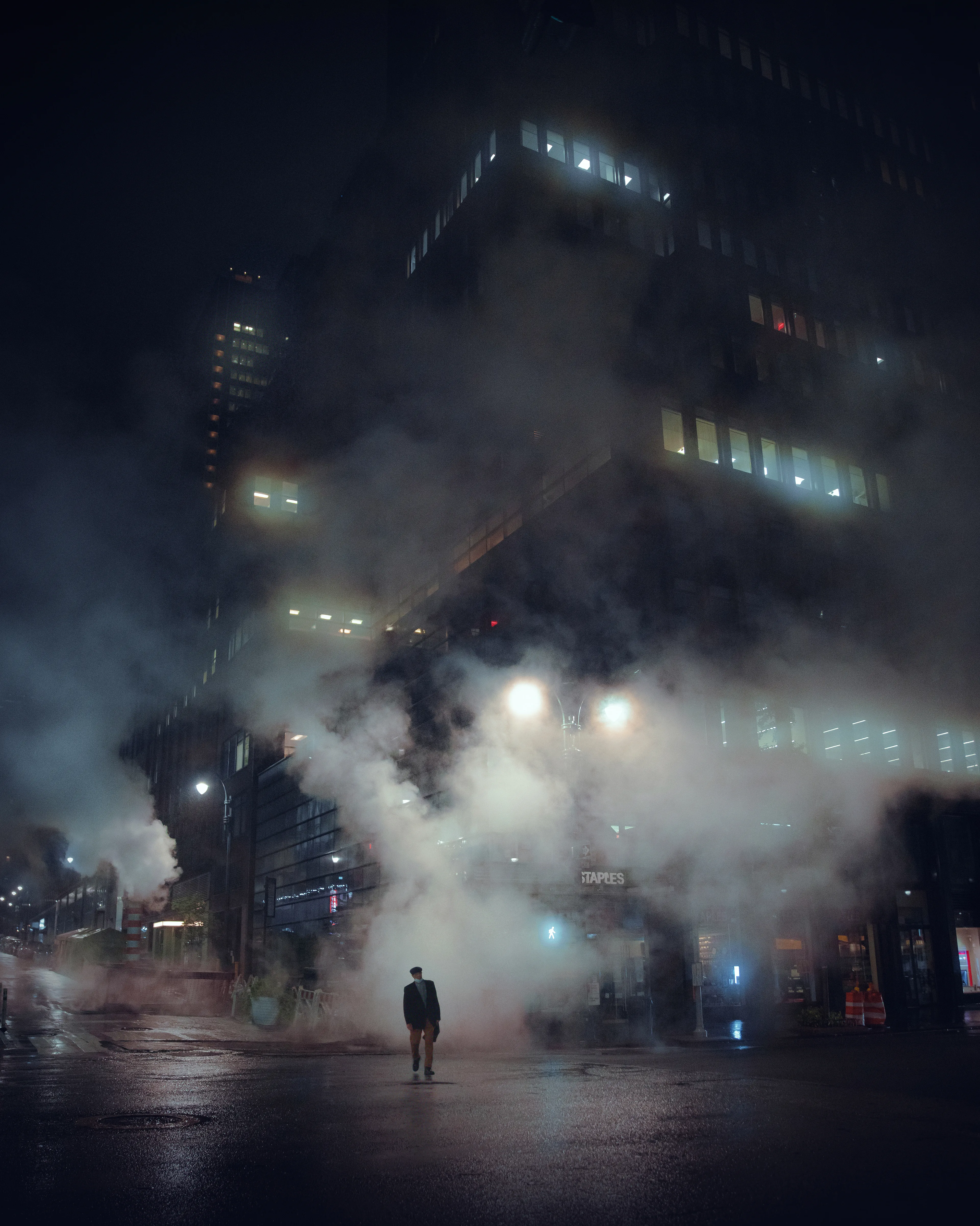 “Midtown” is part of Billy Dinh’s series “The Last Ones” from New York City, NY. USA. It follows the lone figure through a desolate almost unrecognizable Midtown Manhattan on a cold night in Fall of 2020. — The Last Ones is a photography series showcasing the emptiness and scale of normally populated areas across urban parts of the world. Each photo takes advantage of these lonely moments as the individuals wander the deserted almost post-apocalyptic dystopian-like version of each place. There’s a certain eeriness and mystery to each image with how the figures are within their environments. It’s as if they are one of the last ones left. 