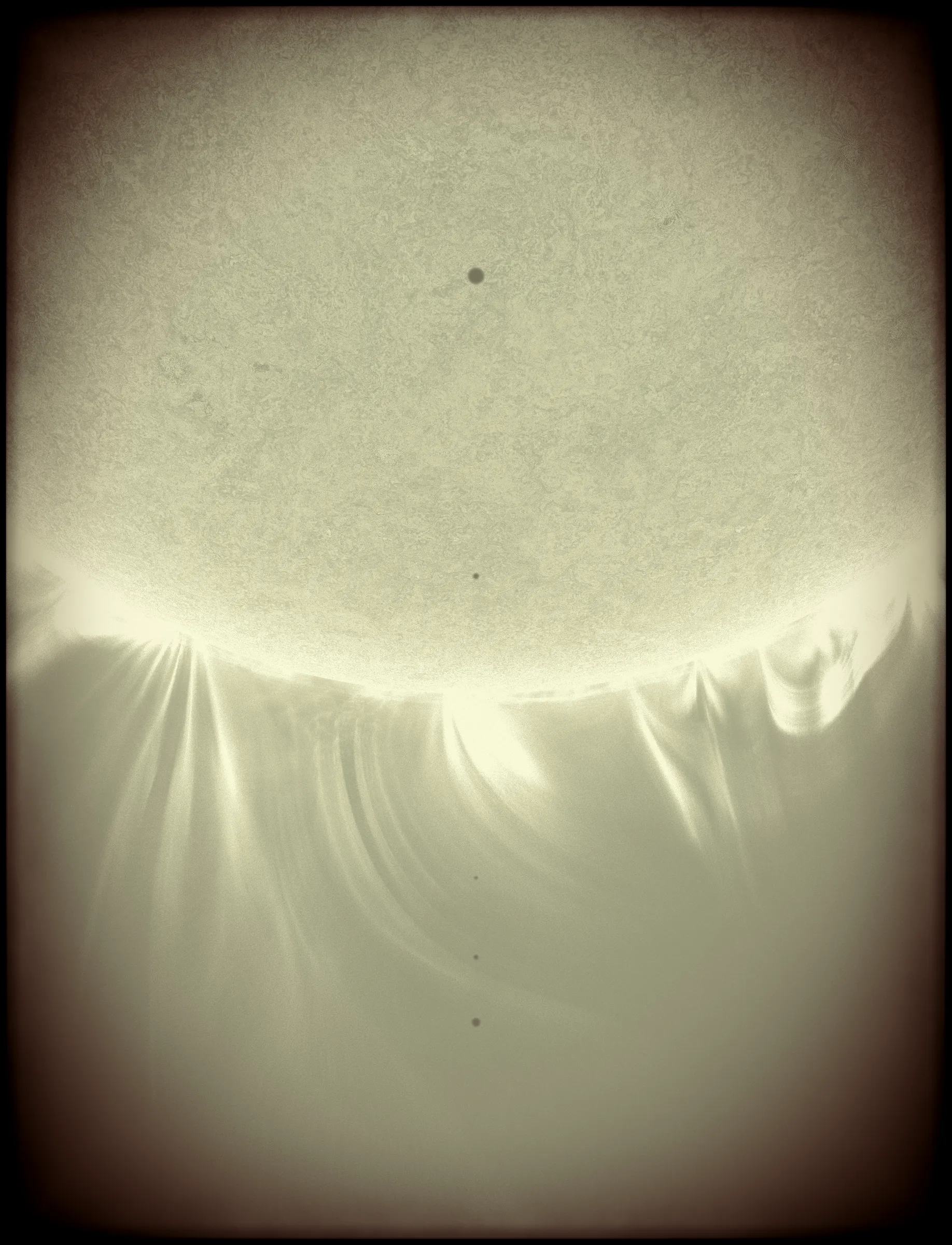 Solar Transits is a procedural exploration of the origins of astrophotography. Each image in this series depicts a randomly generated astronomical event but viewed through the lens of mid-to-late 19th century image capture techniques. The collection features a variety of rare alignments of stars, planets and moons, and are rendered in the spirit of the daguerreotype.

In June of 2012, I took a trip to Minneapolis to speak at the Eyeo Festival. Venus was going to transit while I was there. I was curious. I had not seen a transit before. At 5:09 pm on June 5th, a nearly imperceptible black circle began its march across the sun. Were it not a predicted mathematical certainty, it is doubtful anyone would have noticed. For six minutes, the light from the sun was 0.087% dimmer.

It is a significant thing to see an object silhouetted against the sun. We are so accustom to seeing our perfect circle of pure light that we can't help but to celebrate the occasions where something blocks the view. I still feel a little more excitement when a slight shadow shoots across the landscape on a cloudless day, the source being an extremely rare transit of a commercial jet liner.

Exponentially more rare is the planetary transit. When Venus hangs on the horizon, glowing against the night sky, it is all too easy to think it another star. Only when it is viewed in silhouette can its position in our universe be fully appreciated: orbitally locked like us, and forever drawing it's path around the sun. That tiny black circle effected me in a big way. The scale of the cosmos shifted into perspective. That doesn’t happen often. I was incredibly moved. It was an experience I will never forget. This project is an homage to that strange once-in-a-lifetime event.

As it turns out, I was very lucky to have seen it at all. In the time since my birth in 1972, a Venus transit has only happened twice. The 1st time was in 2004 but I lived in a part of the world where it was not visible. The 2nd time was in 2012. Unless I live to be 145 years old, there won’t be a 3rd time. There are a couple silver linings: the Great American solar eclipse is on April 8 2024, and Mercury will transit in 2032.

The first 10 sales will have the option to purchase their output in the form of a framed daguerreotype.