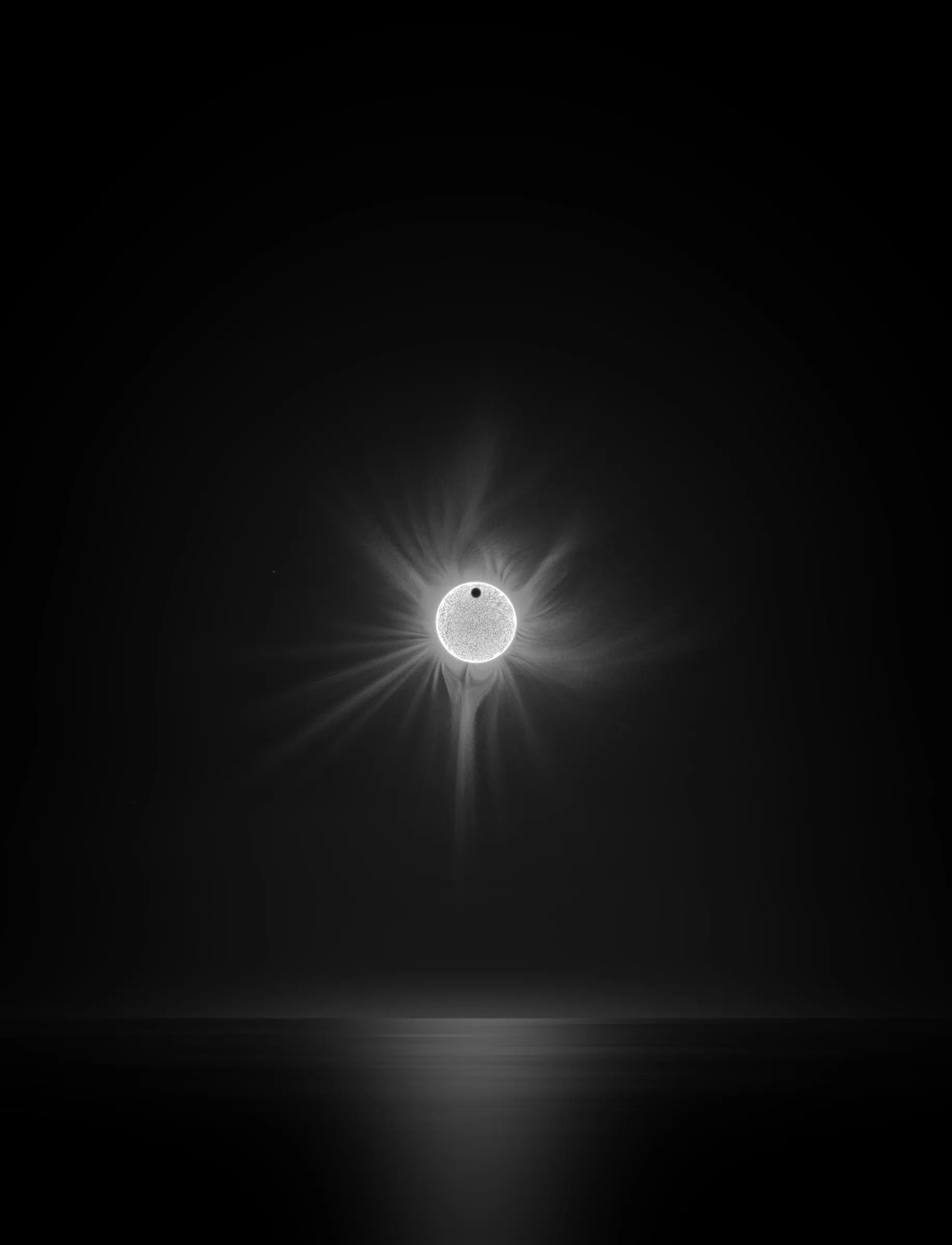 Solar Transits is a procedural exploration of the origins of astrophotography. Each image in this series depicts a randomly generated astronomical event but viewed through the lens of mid-to-late 19th century image capture techniques. The collection features a variety of rare alignments of stars, planets and moons, and are rendered in the spirit of the daguerreotype.

In June of 2012, I took a trip to Minneapolis to speak at the Eyeo Festival. Venus was going to transit while I was there. I was curious. I had not seen a transit before. At 5:09 pm on June 5th, a nearly imperceptible black circle began its march across the sun. Were it not a predicted mathematical certainty, it is doubtful anyone would have noticed. For six minutes, the light from the sun was 0.087% dimmer.

It is a significant thing to see an object silhouetted against the sun. We are so accustom to seeing our perfect circle of pure light that we can't help but to celebrate the occasions where something blocks the view. I still feel a little more excitement when a slight shadow shoots across the landscape on a cloudless day, the source being an extremely rare transit of a commercial jet liner.

Exponentially more rare is the planetary transit. When Venus hangs on the horizon, glowing against the night sky, it is all too easy to think it another star. Only when it is viewed in silhouette can its position in our universe be fully appreciated: orbitally locked like us, and forever drawing it's path around the sun. That tiny black circle effected me in a big way. The scale of the cosmos shifted into perspective. That doesn’t happen often. I was incredibly moved. It was an experience I will never forget. This project is an homage to that strange once-in-a-lifetime event.

As it turns out, I was very lucky to have seen it at all. In the time since my birth in 1972, a Venus transit has only happened twice. The 1st time was in 2004 but I lived in a part of the world where it was not visible. The 2nd time was in 2012. Unless I live to be 145 years old, there won’t be a 3rd time. There are a couple silver linings: the Great American solar eclipse is on April 8 2024, and Mercury will transit in 2032.

The first 10 sales will have the option to purchase their output in the form of a framed daguerreotype.