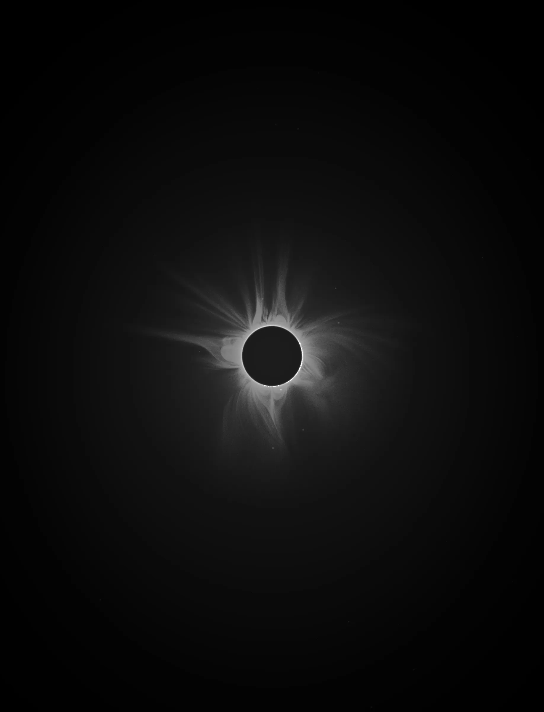 Solar Transits is a procedural exploration of the origins of astrophotography. Each image in this series depicts a randomly generated astronomical event but viewed through the lens of mid-to-late 19th century image capture techniques. The collection features a variety of rare alignments of stars, planets and moons, and are rendered in the spirit of the daguerreotype.

In June of 2012, I took a trip to Minneapolis to speak at the Eyeo Festival. Venus was going to transit while I was there. I was curious. I had not seen a transit before. At 5:09 pm on June 5th, a nearly imperceptible black circle began its march across the sun. Were it not a predicted mathematical certainty, it is doubtful anyone would have noticed. For six minutes, the light from the sun was 0.087% dimmer.

It is a significant thing to see an object silhouetted against the sun. We are so accustom to seeing our perfect circle of pure light that we can't help but to celebrate the occasions where something blocks the view. I still feel a little more excitement when a slight shadow shoots across the landscape on a cloudless day, the source being an extremely rare transit of a commercial jet liner.

Exponentially more rare is the planetary transit. When Venus hangs on the horizon, glowing against the night sky, it is all too easy to think it another star. Only when it is viewed in silhouette can its position in our universe be fully appreciated: orbitally locked like us, and forever drawing it's path around the sun. That tiny black circle effected me in a big way. The scale of the cosmos shifted into perspective. That doesn’t happen often. I was incredibly moved. It was an experience I will never forget. This project is an homage to that strange once-in-a-lifetime event.

As it turns out, I was very lucky to have seen it at all. In the time since my birth in 1972, a Venus transit has only happened twice. The 1st time was in 2004 but I lived in a part of the world where it was not visible. The 2nd time was in 2012. Unless I live to be 145 years old, there won’t be a 3rd time. There are a couple silver linings: the Great American solar eclipse is on April 8 2024, and Mercury will transit in 2032.

The first 10 sales will have the option to purchase their output in the form of a framed daguerreotype.