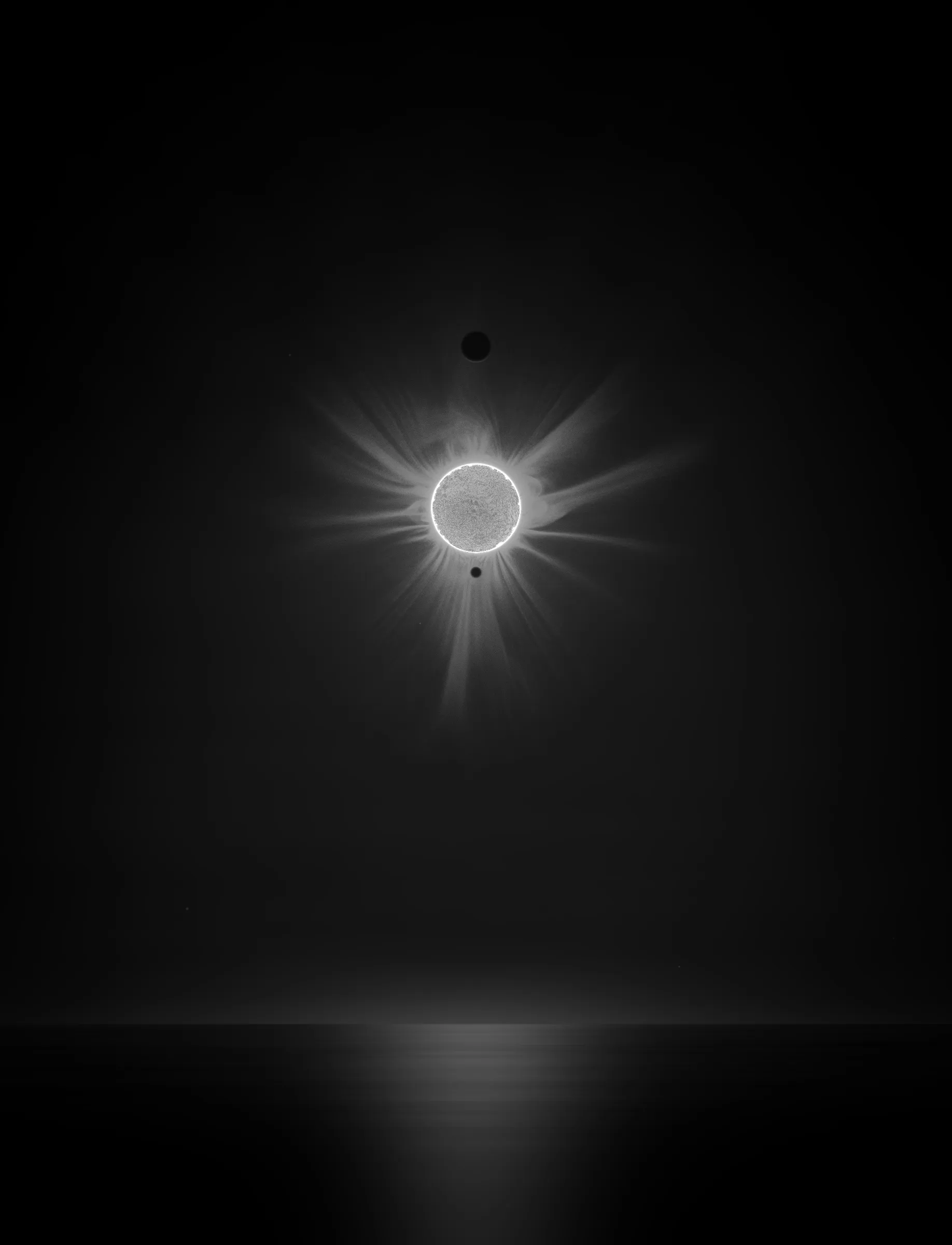 Solar Transits is a procedural exploration of the origins of astrophotography. Each image in this series depicts a randomly generated astronomical event but viewed through the lens of mid-to-late 19th century image capture techniques. The collection features a variety of rare alignments of stars, planets and moons, and are rendered in the spirit of the daguerreotype.

In June of 2012, I took a trip to Minneapolis to speak at the Eyeo Festival. Venus was going to transit while I was there. I was curious. I had not seen a transit before. At 5:09 pm on June 5th, a nearly imperceptible black circle began its march across the sun. Were it not a predicted mathematical certainty, it is doubtful anyone would have noticed. For six minutes, the light from the sun was 0.087% dimmer.

It is a significant thing to see an object silhouetted against the sun. We are so accustom to seeing our perfect circle of pure light that we can't help but to celebrate the occasions where something blocks the view. I still feel a little more excitement when a slight shadow shoots across the landscape on a cloudless day, the source being an extremely rare transit of a commercial jet liner.

Exponentially more rare is the planetary transit. When Venus hangs on the horizon, glowing against the night sky, it is all too easy to think it another star. Only when it is viewed in silhouette can its position in our universe be fully appreciated: orbitally locked like us, and forever drawing it's path around the sun. That tiny black circle effected me in a big way. The scale of the cosmos shifted into perspective. That doesn’t happen often. I was incredibly moved. It was an experience I will never forget. This project is an homage to that strange once-in-a-lifetime event.

As it turns out, I was very lucky to have seen it at all. In the time since my birth in 1972, a Venus transit has only happened twice. The 1st time was in 2004 but I lived in a part of the world where it was not visible. The 2nd time was in 2012. Unless I live to be 145 years old, there won’t be a 3rd time. There are a couple silver linings: the Great American solar eclipse is on April 8 2024, and Mercury will transit in 2032.

The first 10 sales will have the option to purchase their output in the form of a framed daguerreotype.