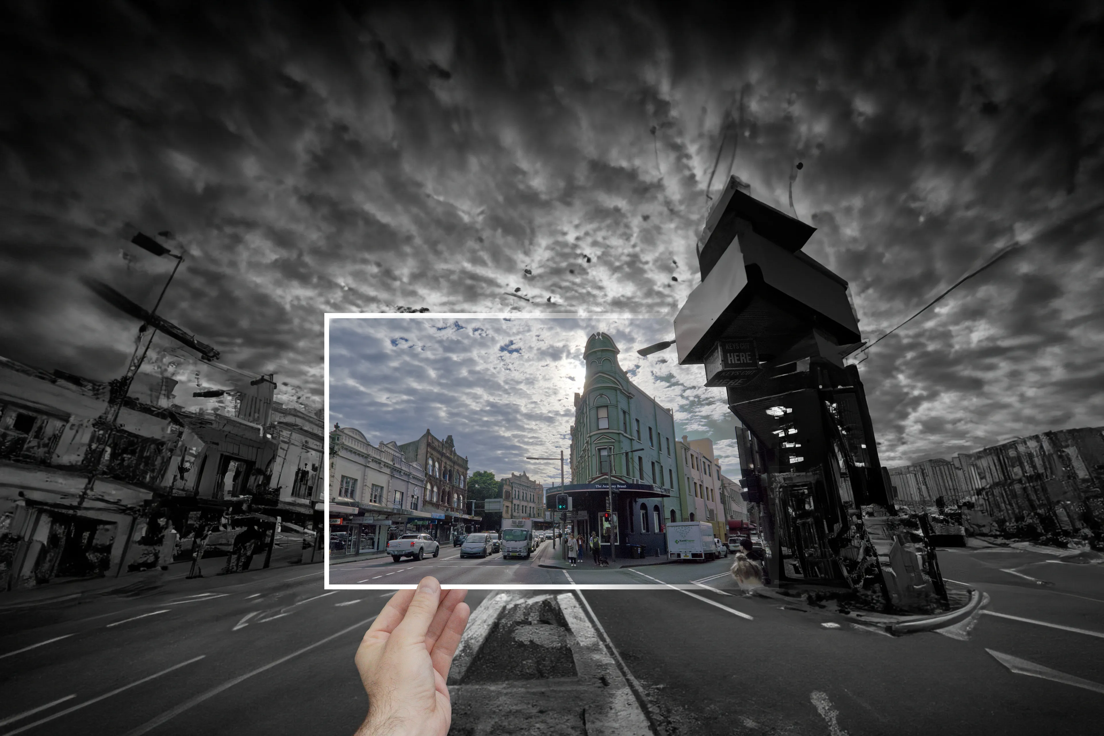 In "This Is How I See The World" I have made street photos from around Sydney, Australia, and invited AI algorithms to "expand" them without prompts.

This collection puts the focus on specific AI generation at specific times in history and shows us, the human viewer, what each AI imagines our world to be like. 

By grounding each piece in the real world and letting the image be the only prompt the AI receives, we are invited into an AI dream of reality.

Do we recognise what we see in this dream?  Do we like it, dislike it - or experience some other feeling?

Each piece includes a human hand to remind us that we are the ones who have agency, creativity and can "touch" the world around us.

At the same time we are trusting AI more and more to interpret the world and help us make sense of it.  Seeing the world through AI perspectives, and revealing how that changes over time, is a powerful way to reflect on our relationship to these tools and reality.

The composition of these images references the habit of holding up old photos of current locations to show how they have changed over time. 

In this case, we hold up the present reality to show how our tools imagine the places we live.

"This Is How I See The World" will be an ongoing collection examining different AI algorithms over time.