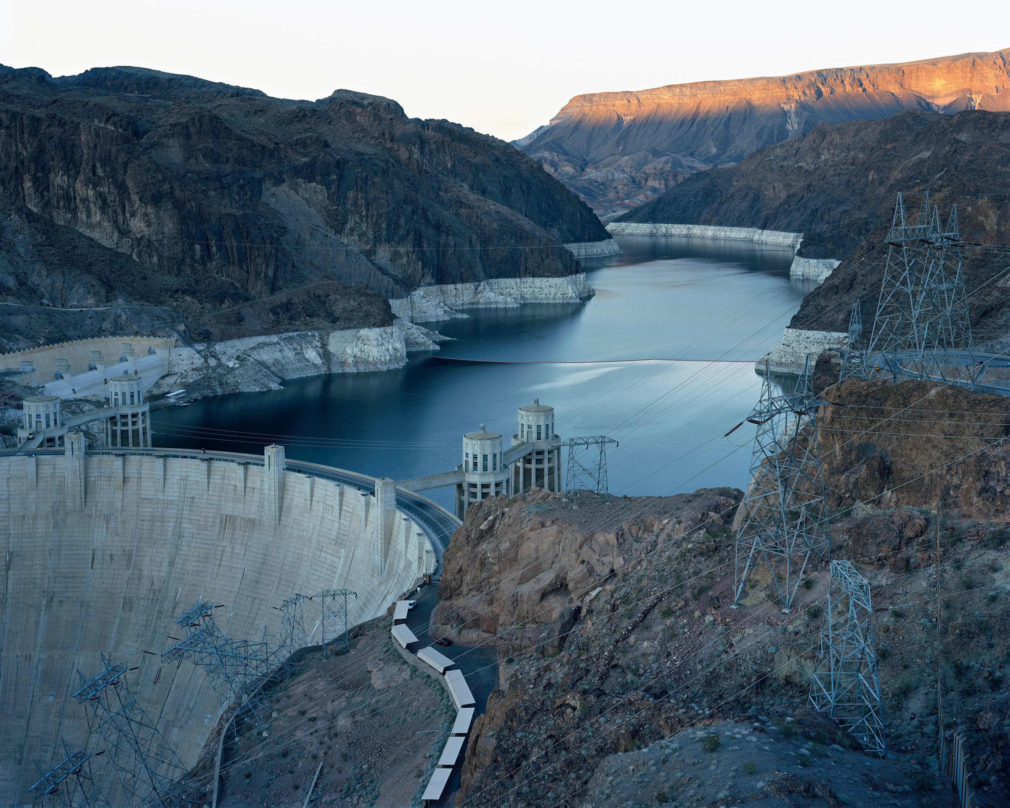 "American Power investigates notions of power, both electrical and political. Who has it, what do they do with it, and how does it affect other people? From 2003 to 2008, I traveled across the United States to photograph in and around sites where fossil fuel, nuclear, hydroelectric, wind, solar, and other alternative power are produced. The resulting pictures form a portrait of the United States as it clings to past comforts and gropes for a more sensible future. American Power underscores the intersection between energy production, energy consumption, and climate change. In short, I hope to illuminate the relationship between American society and the American landscape.

American Power is also about the deepening of my political convictions. While making this body of work, I encountered Homeland Security obstacles, environmental contamination, corporate impenetrability, and a culture of excess. These experiences turned my initial curiosity into rage and sadness. American Power has led me to think harder about the artist’s role in a country teetering between collapse and transformation". - Mitch Epstein

Edition: 1 of 1