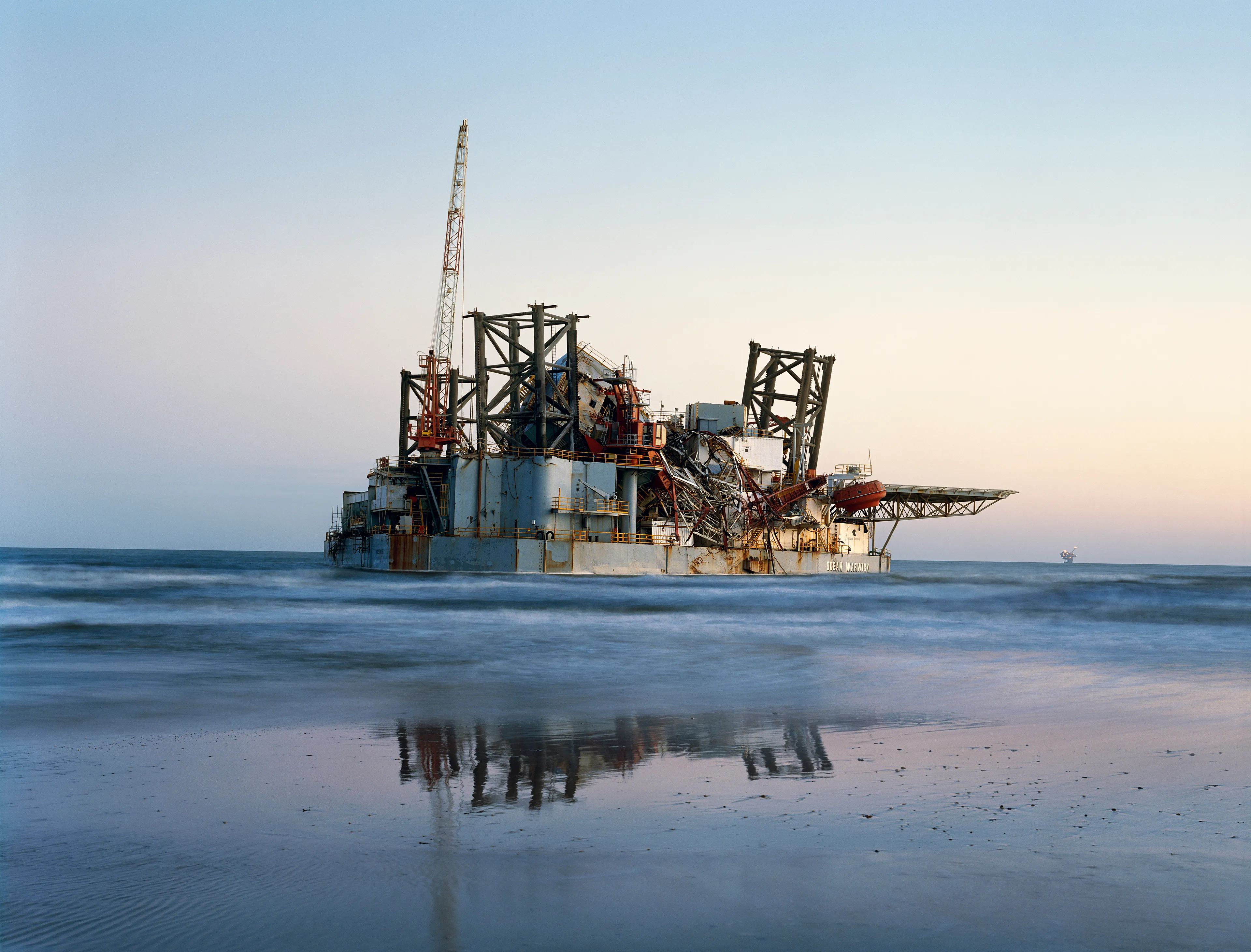 "American Power investigates notions of power, both electrical and political. Who has it, what do they do with it, and how does it affect other people? From 2003 to 2008, I traveled across the United States to photograph in and around sites where fossil fuel, nuclear, hydroelectric, wind, solar, and other alternative power are produced. The resulting pictures form a portrait of the United States as it clings to past comforts and gropes for a more sensible future. American Power underscores the intersection between energy production, energy consumption, and climate change. In short, I hope to illuminate the relationship between American society and the American landscape.

American Power is also about the deepening of my political convictions. While making this body of work, I encountered Homeland Security obstacles, environmental contamination, corporate impenetrability, and a culture of excess. These experiences turned my initial curiosity into rage and sadness. American Power has led me to think harder about the artist’s role in a country teetering between collapse and transformation". - Mitch Epstein

Edition: 1 of 1