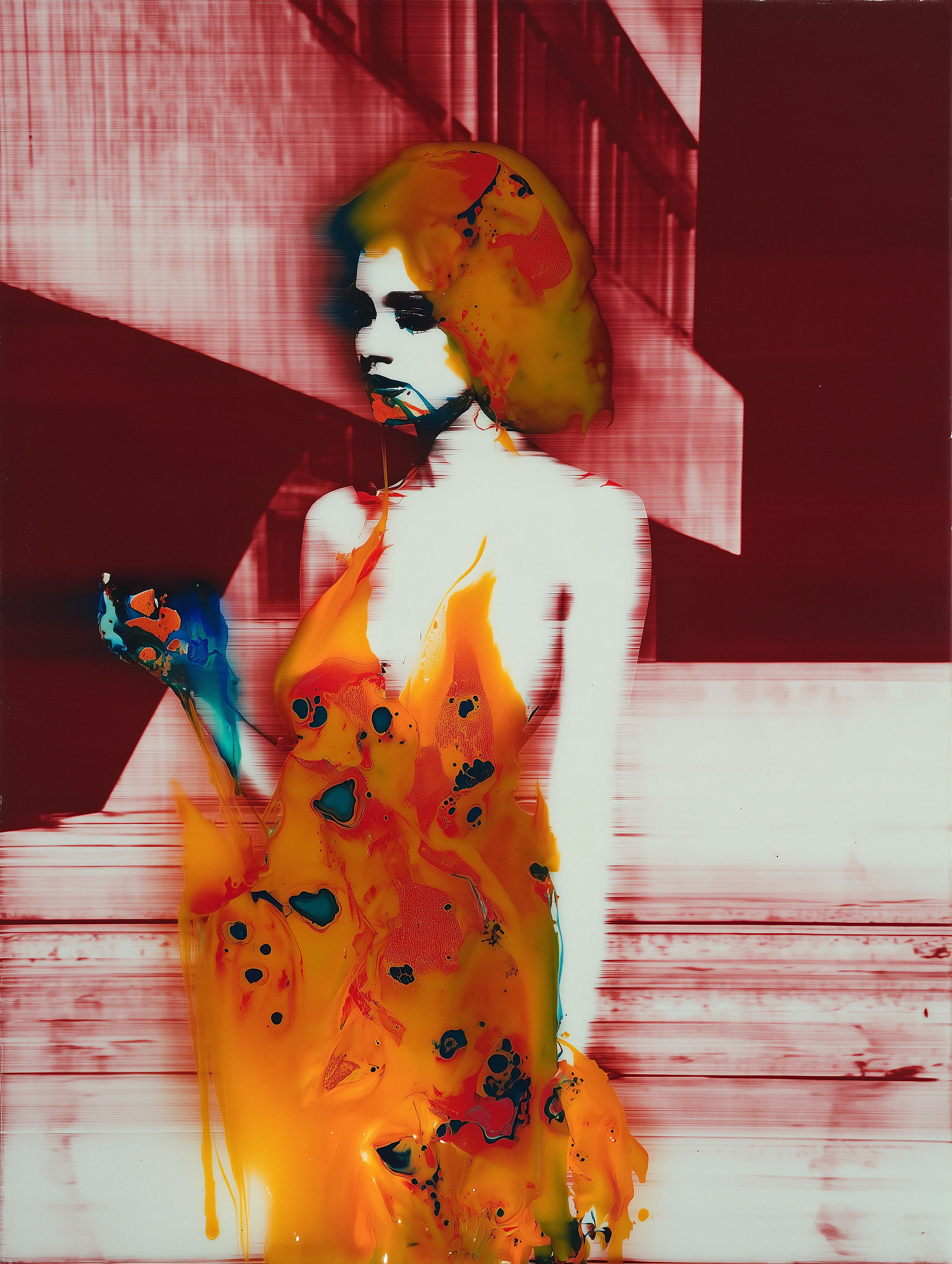 The figure glows through veils of molten colour, her form gently dissolving into waves of orange and blue. What might appear as fracture becomes radiance — an unfolding where beauty is not broken but transformed. Here, the portrait reveals emergence as a quiet rupture, a passage between stillness and becoming.