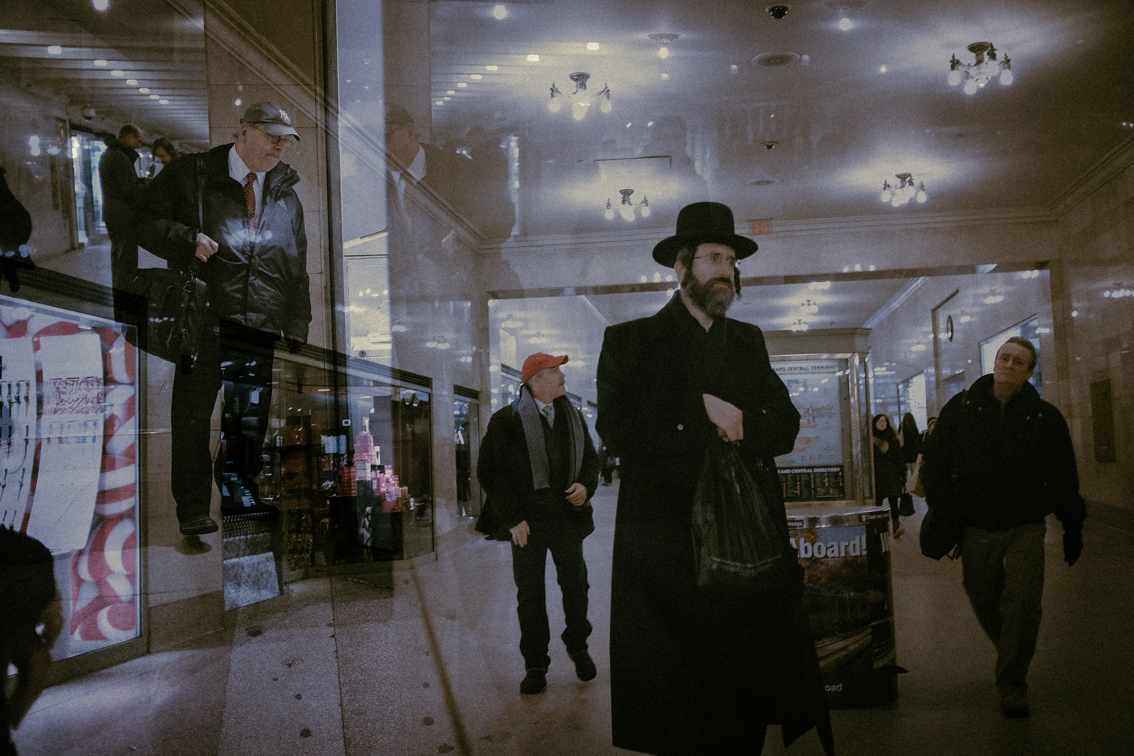 The City is engraved in its inhabitants, who in turn engrave themselves unto each other, not knowing how, when, or why. Identities disappear, dissipate and dilute into the roaring crowd. One question clouds my mind as I stand still observing through my camera’s big wide eye: Will it swallow me whole? Will we become one? One more tag on the wall? One more chewing gum on the ground, stepped on by the weight of the mass, becoming thus the texture of every day, of everyone? 